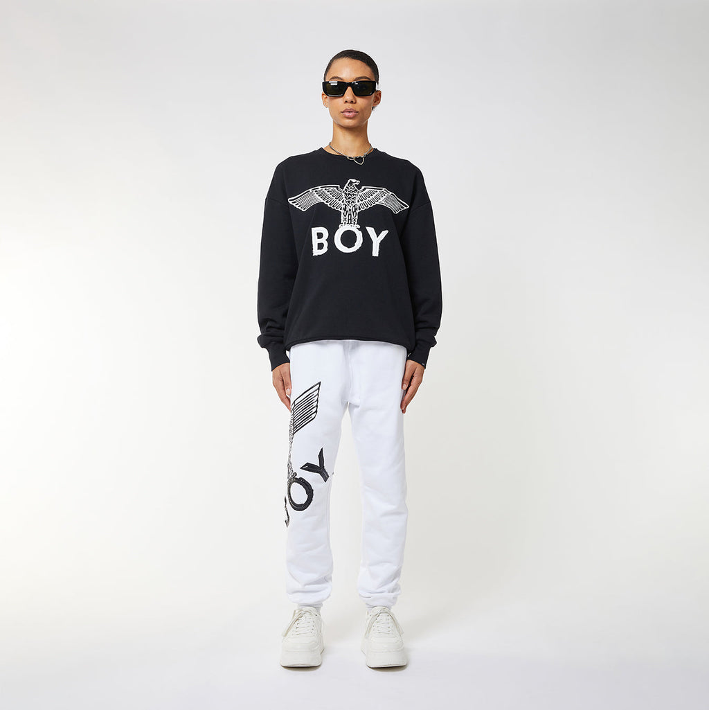Model wearing BOY London sweatshirt on white background