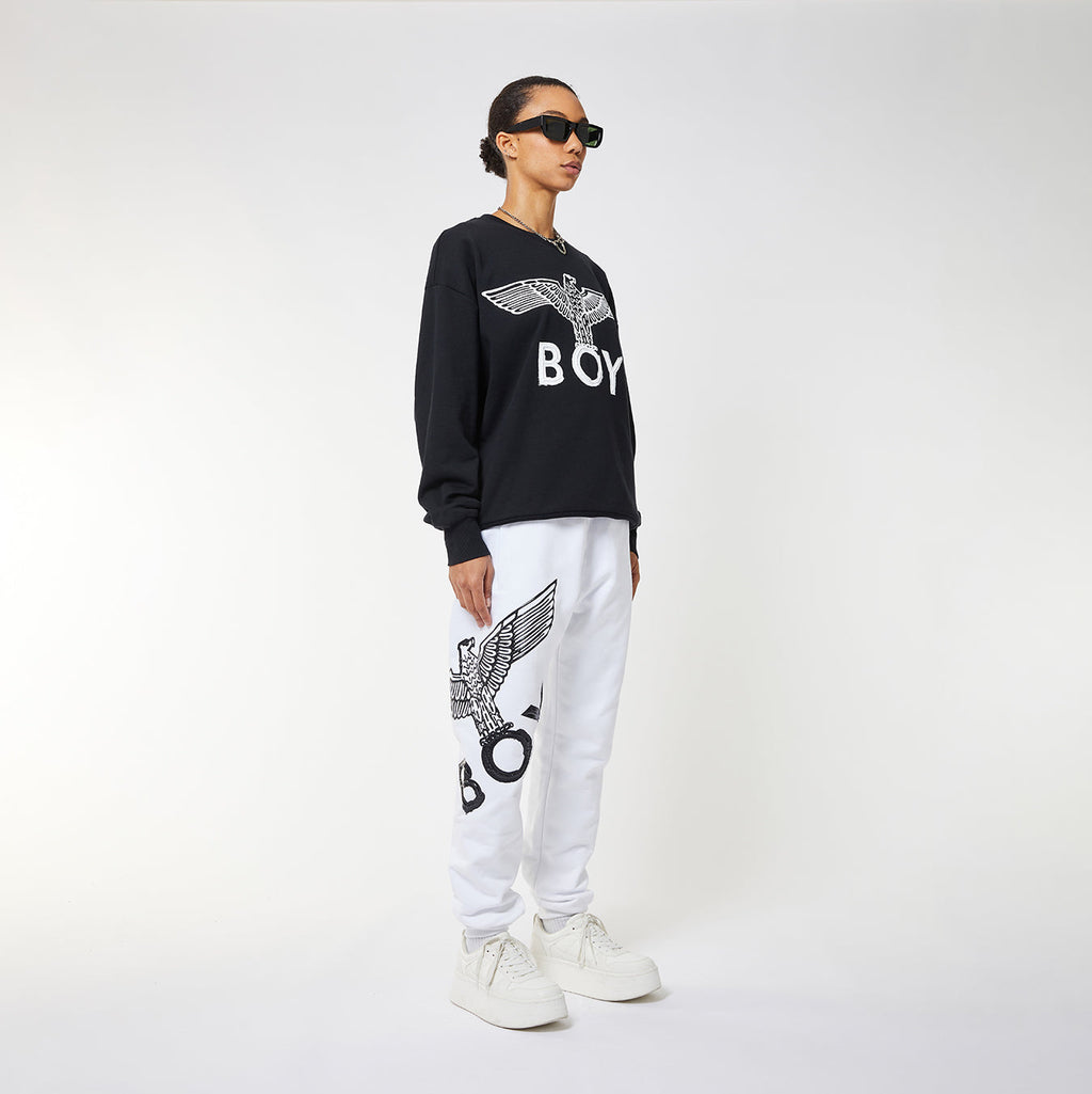 Model wearing BOY London sweatshirt on white background
