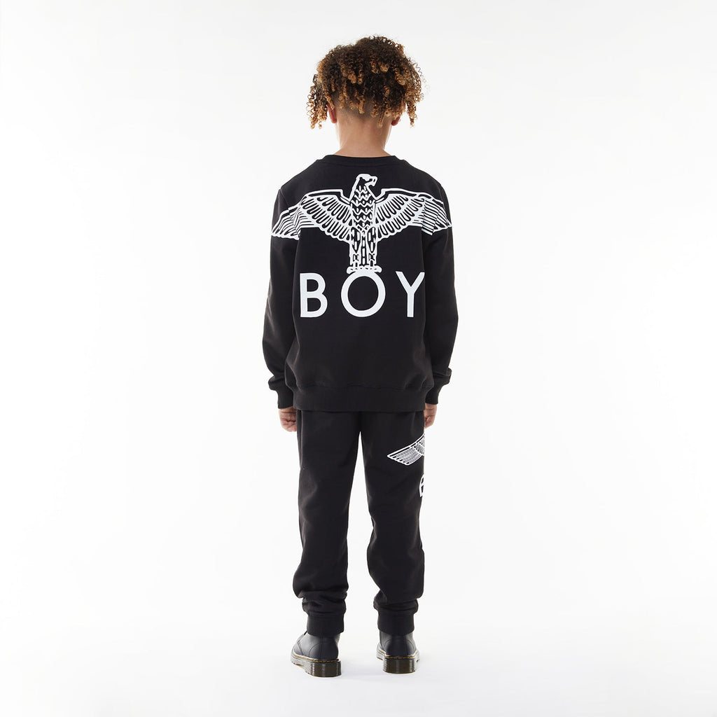 Model wearing BOY London sweatshirt on white background 