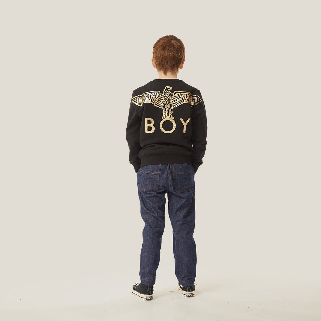 Model wearing BOY London sweatshirt on white background