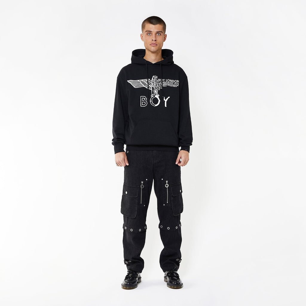 Model wearing BOY London hoodie on white background