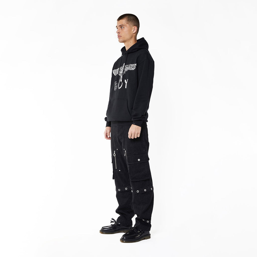 Model wearing BOY London hoodie on white background