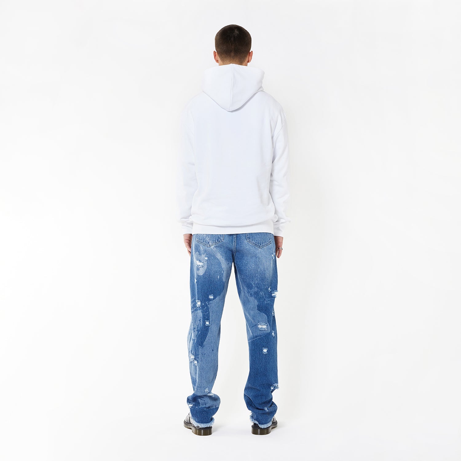 Model wearing BOY London hoodie on white background