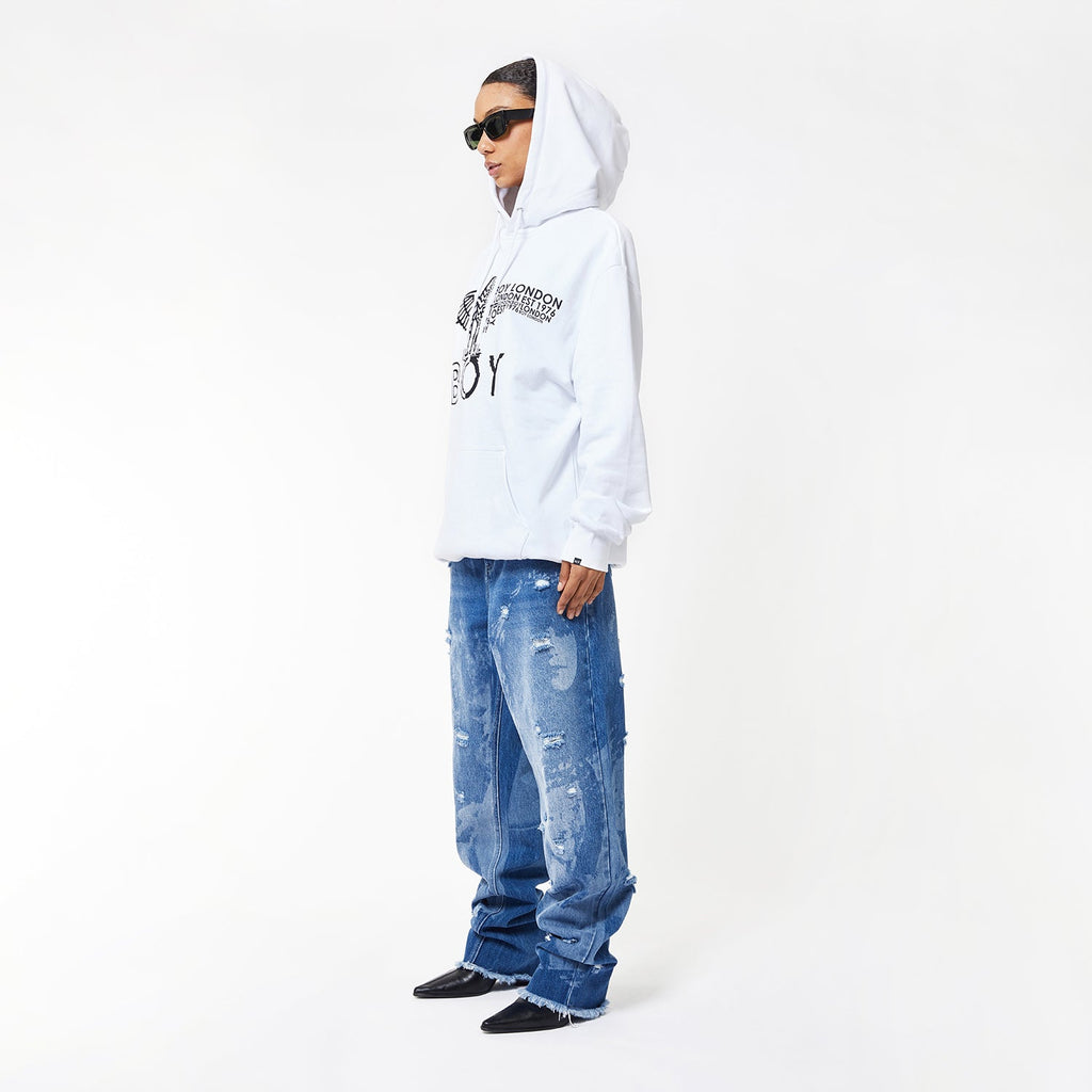 Model wearing BOY London hoodie on white background
