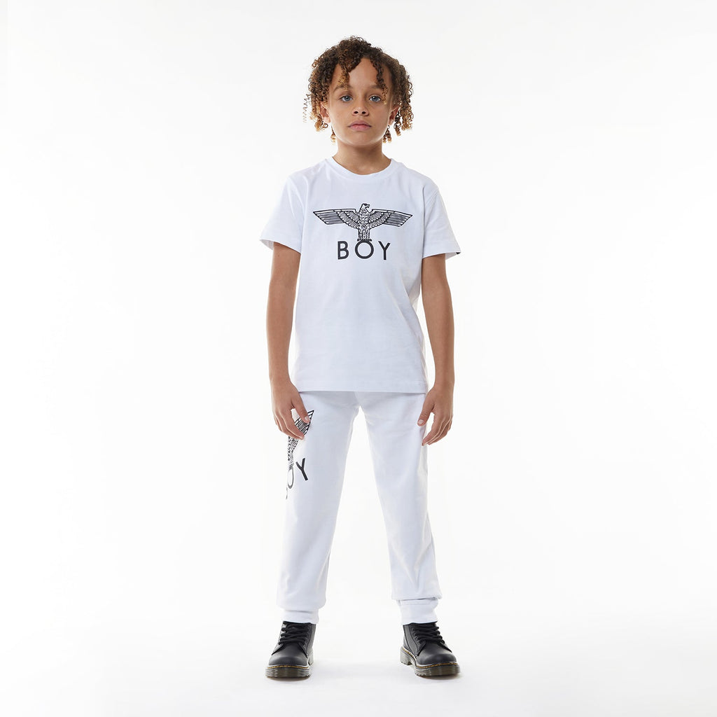 Model wearing White sweatpants with a logo on a white background