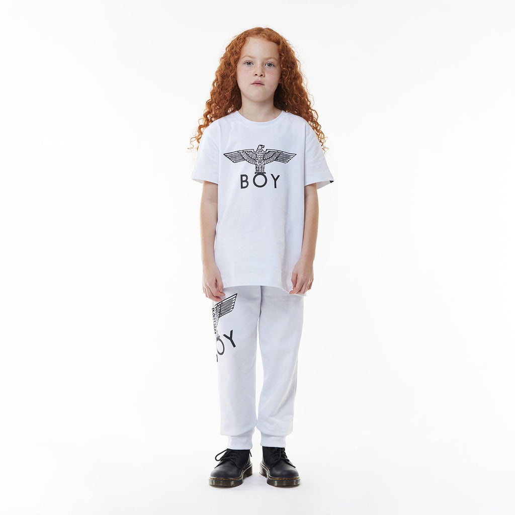 Model wearing White sweatpants with a logo on a white background