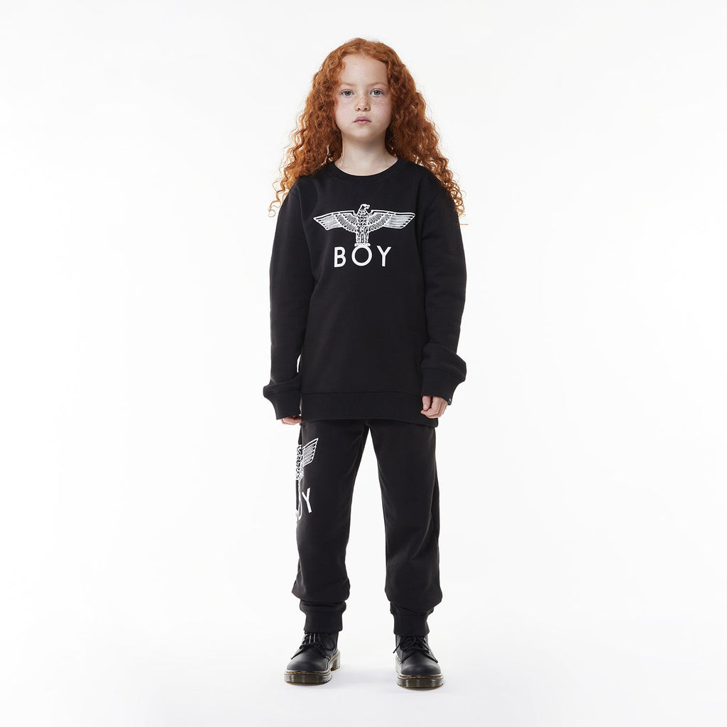 Model wearing BOY London sweatshirt on white background 