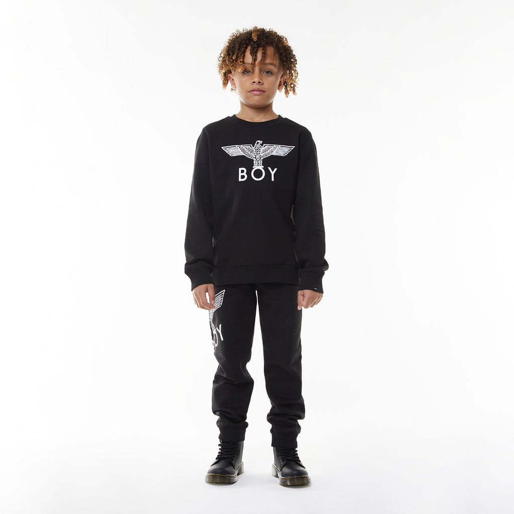 Model wearing BOY London sweatshirt on white background 