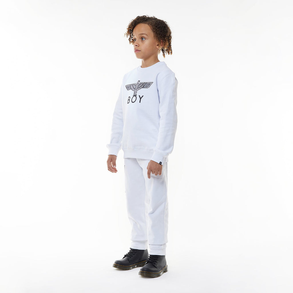 Model wearing White BOY London long-sleeve shirt with brand logo on a white background
