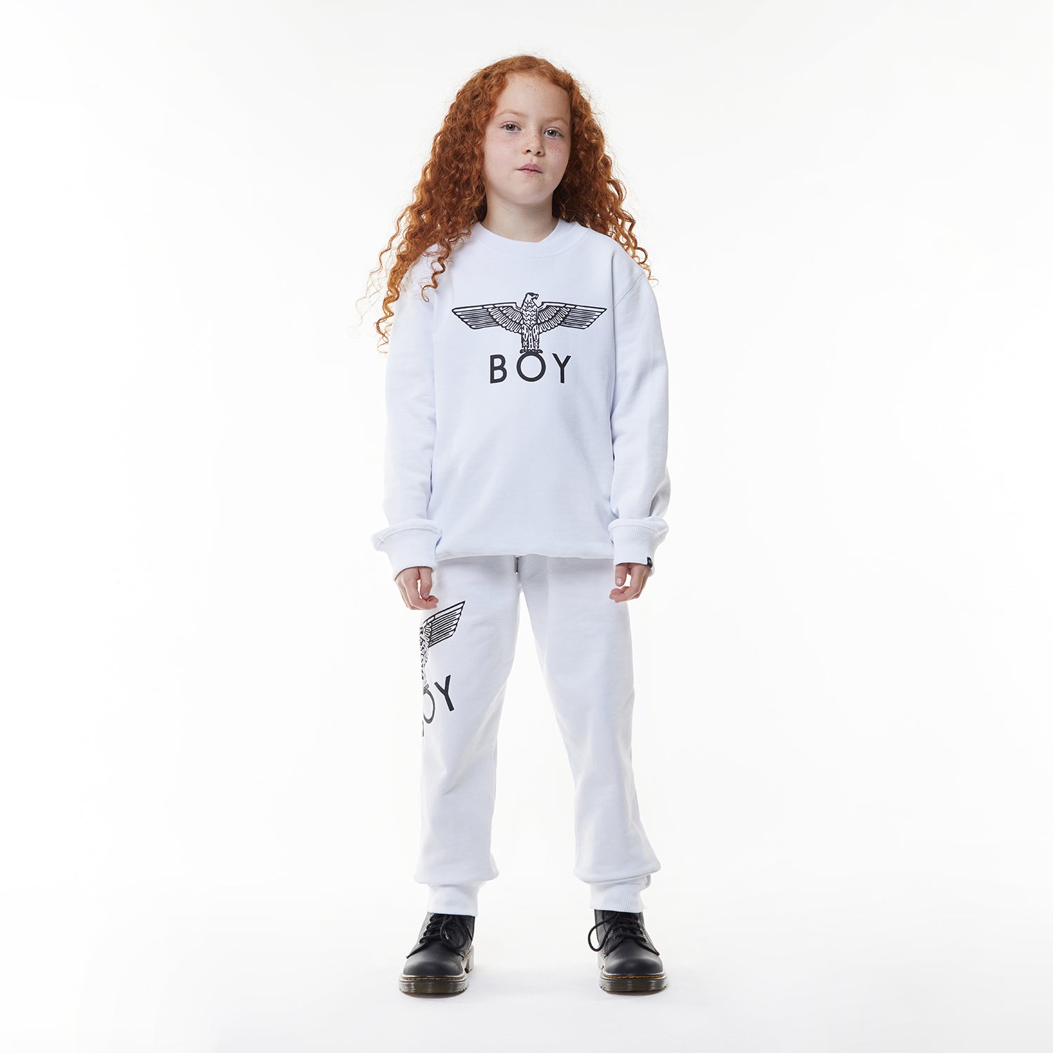 Model wearing White BOY London long-sleeve shirt with brand logo on a white background