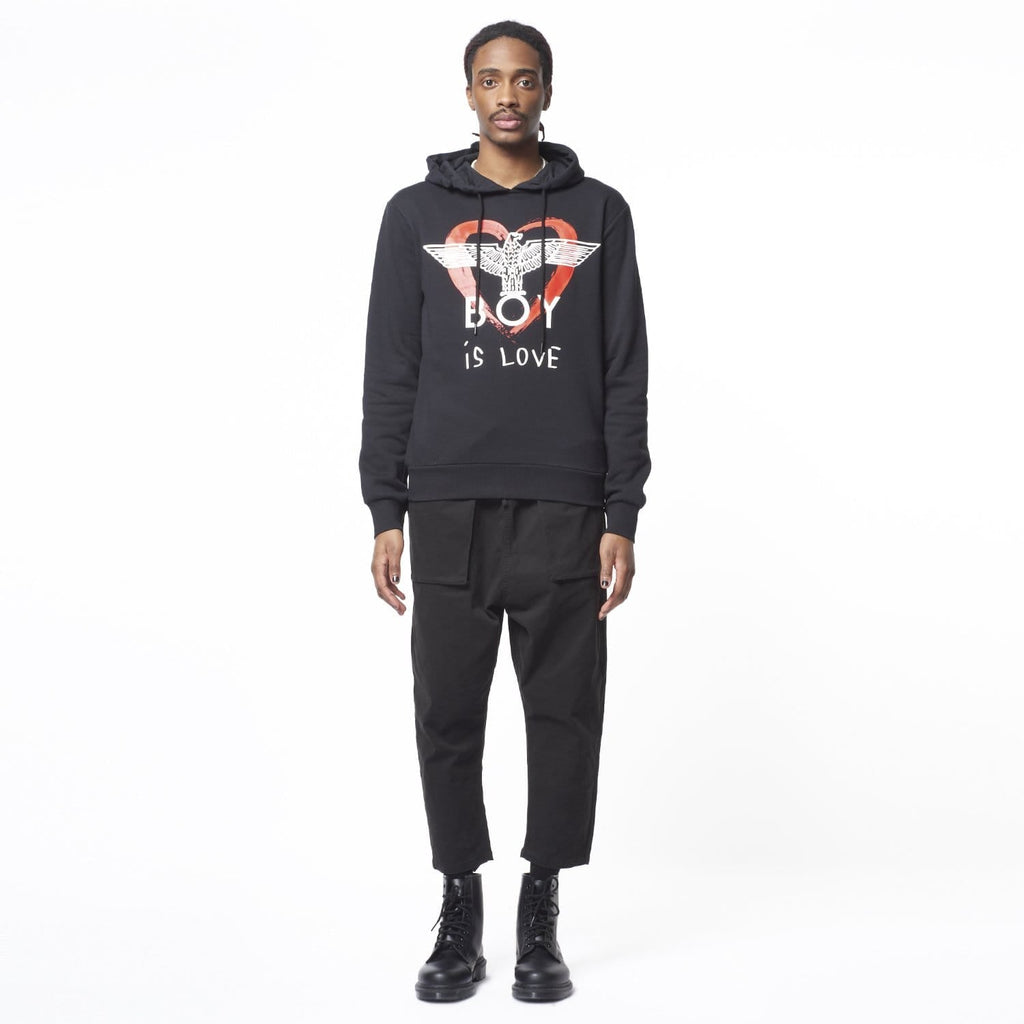 Model wearing BOY London hoodie on white background