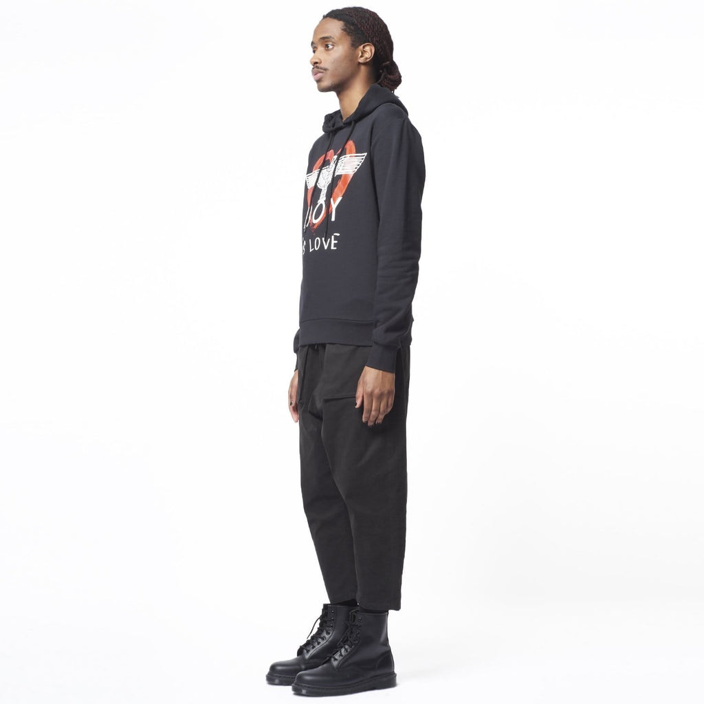 Model wearing BOY London hoodie on white background