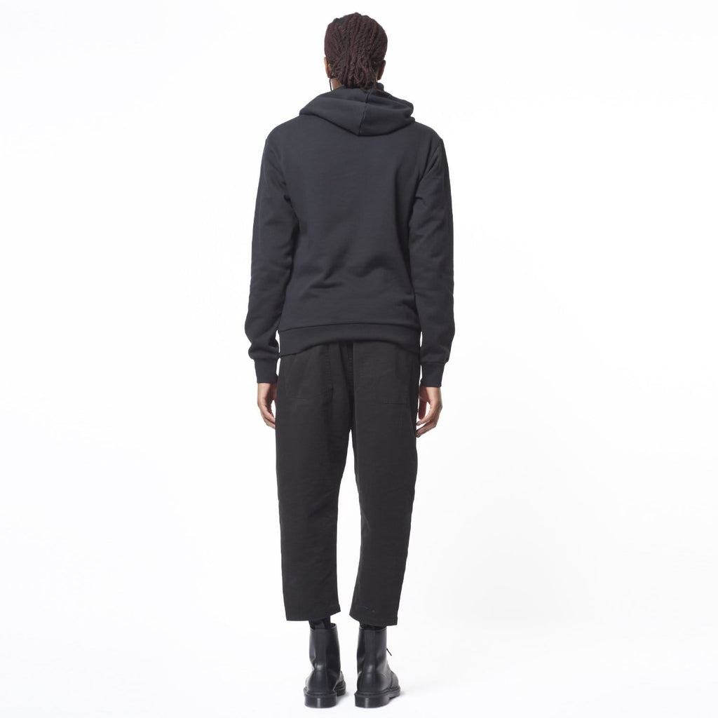 Model wearing BOY London hoodie on white background