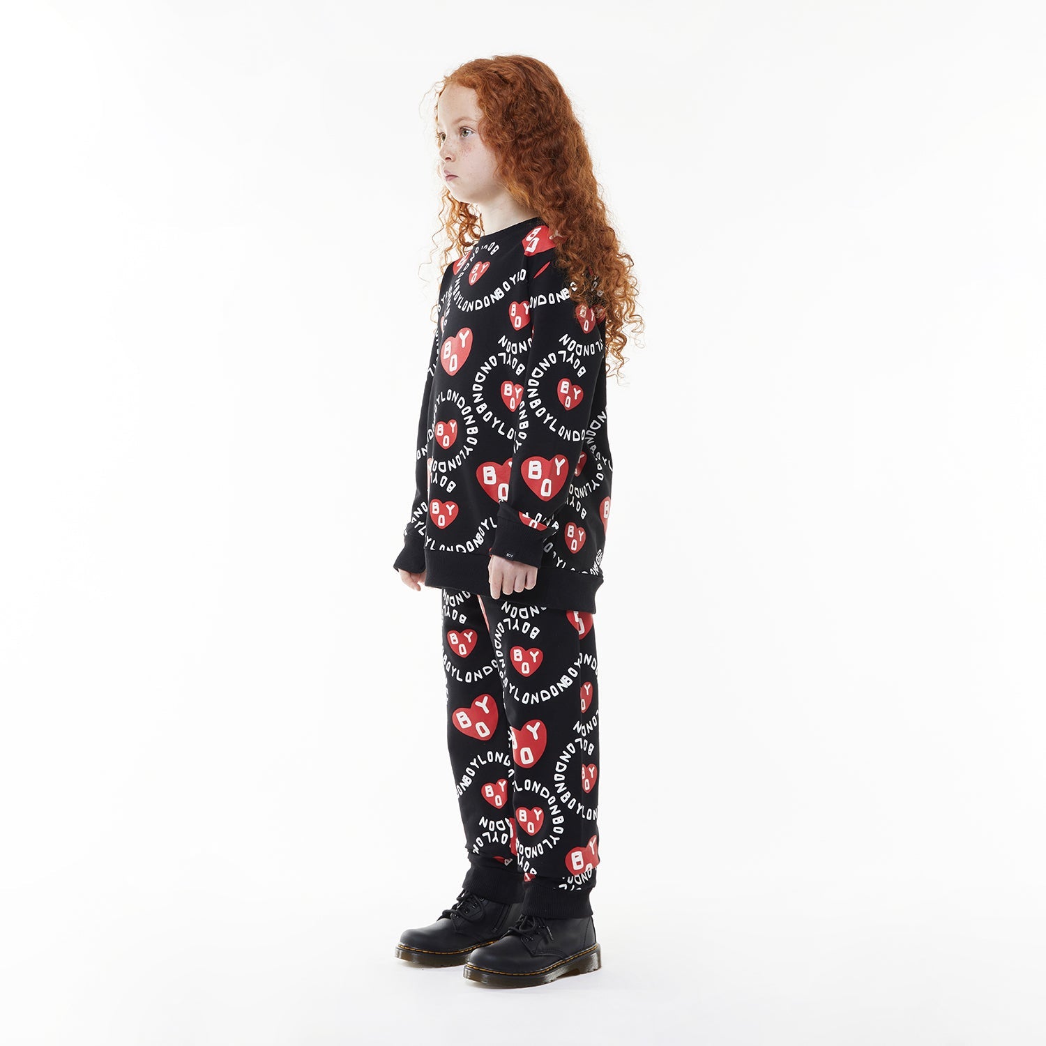 Model wearing BOY London sweatshirt on white background
