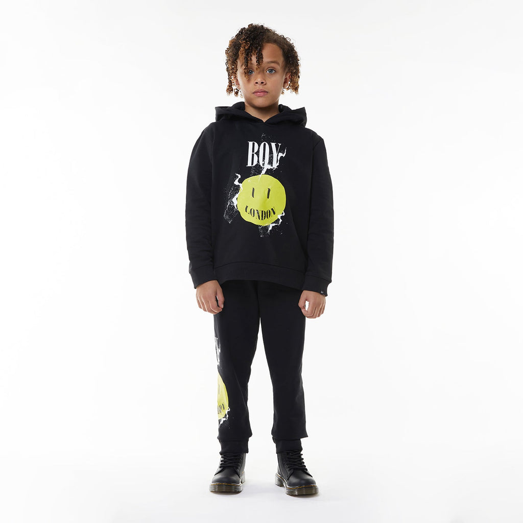 Model wearing BOY London hoodie on white background