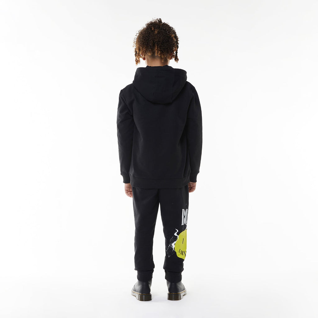 Model wearing BOY London hoodie on white background