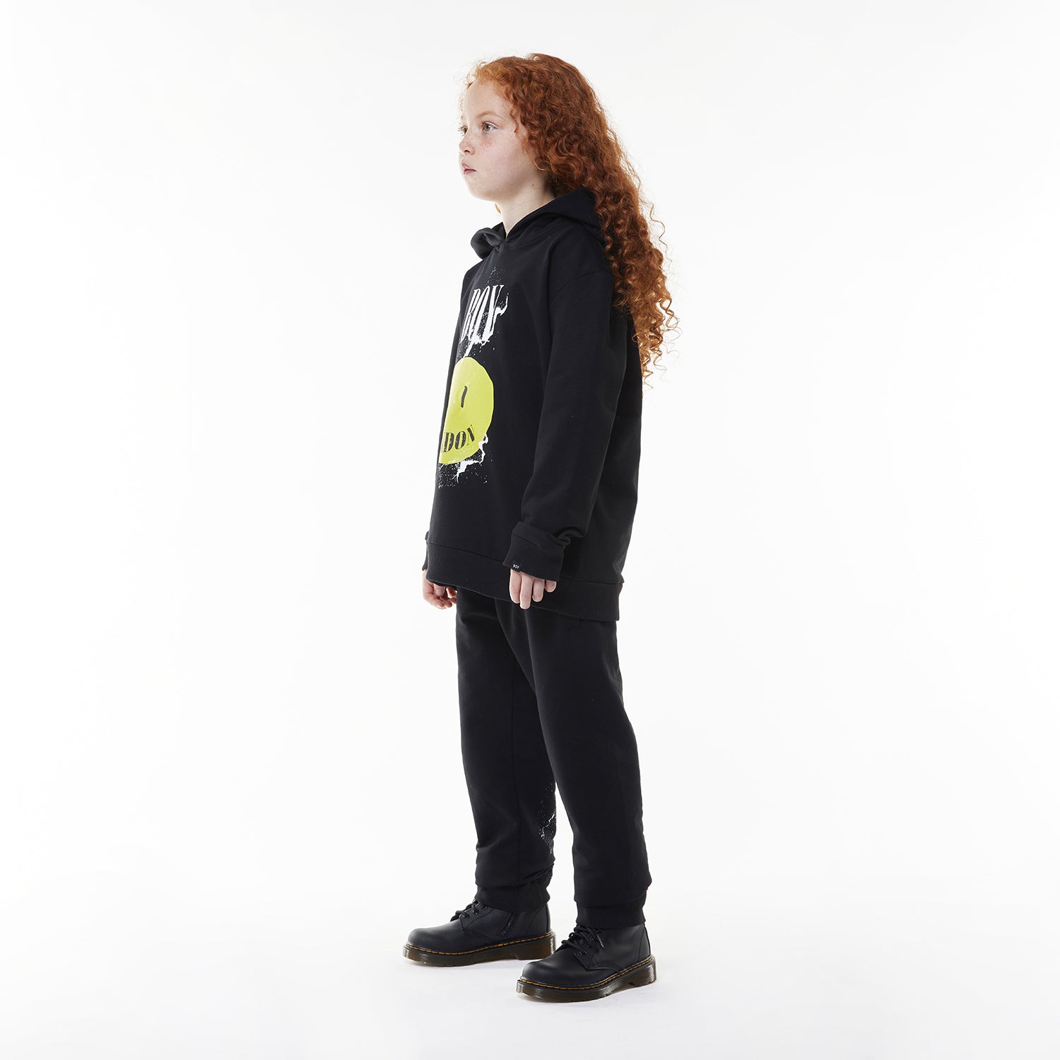 Model wearing BOY London hoodie on white background