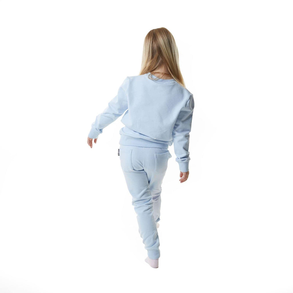 Model wearing BOY London sweatshirt on white background 