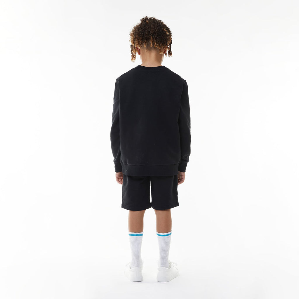 Model wearing BOY London sweatshirt on white background 