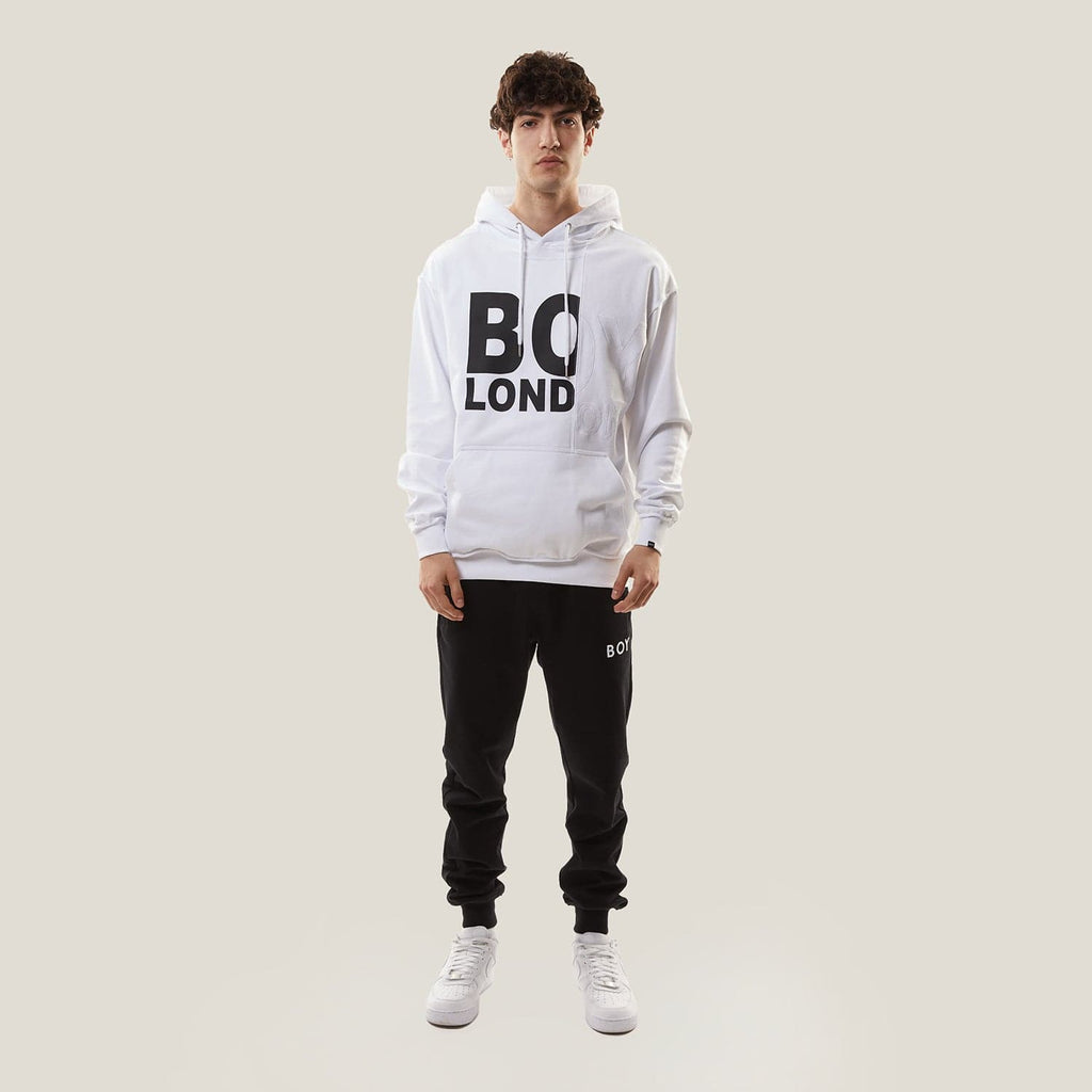 Model wearing White BOY London hoodie with text on a white background