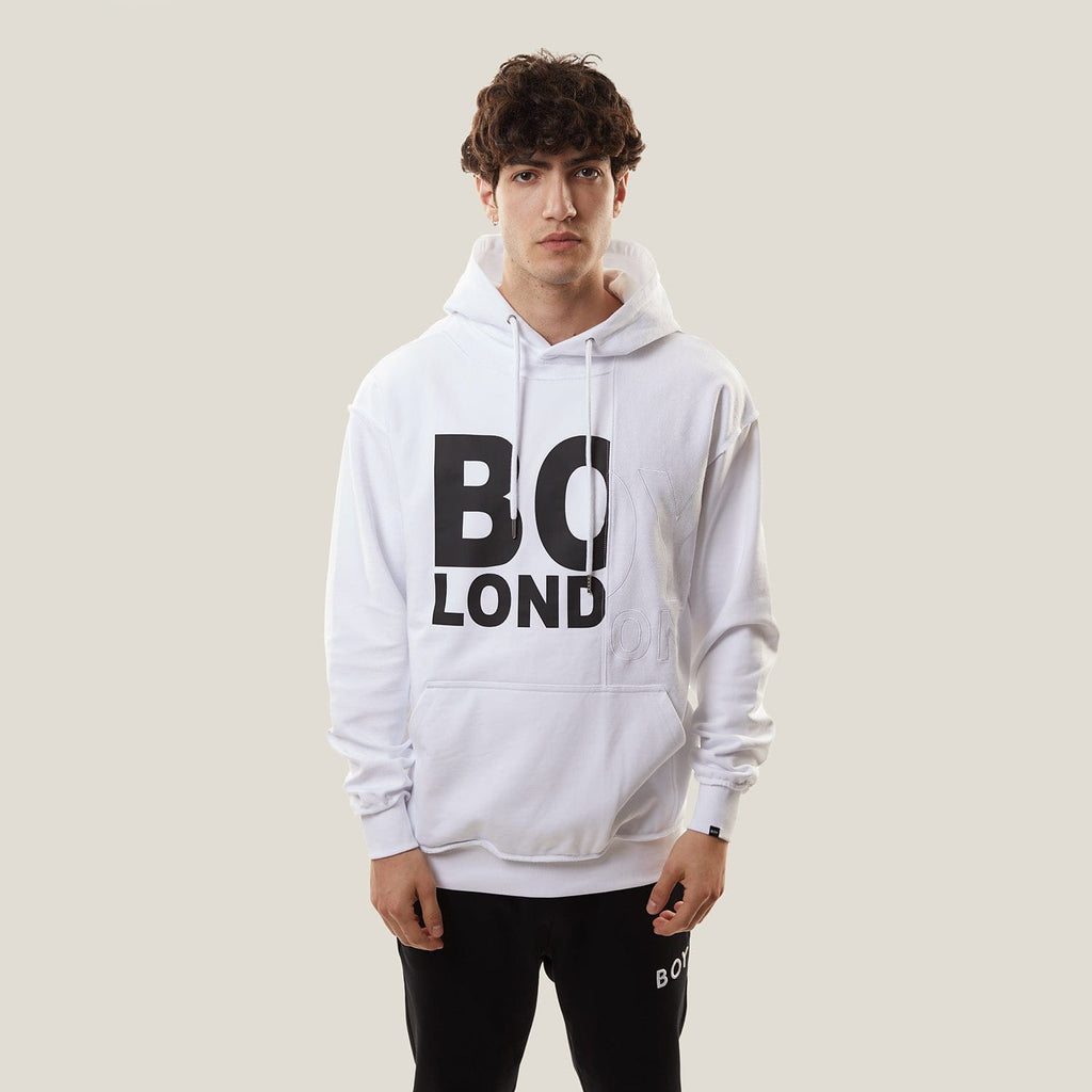 Model wearing White BOY London hoodie with text on a white background