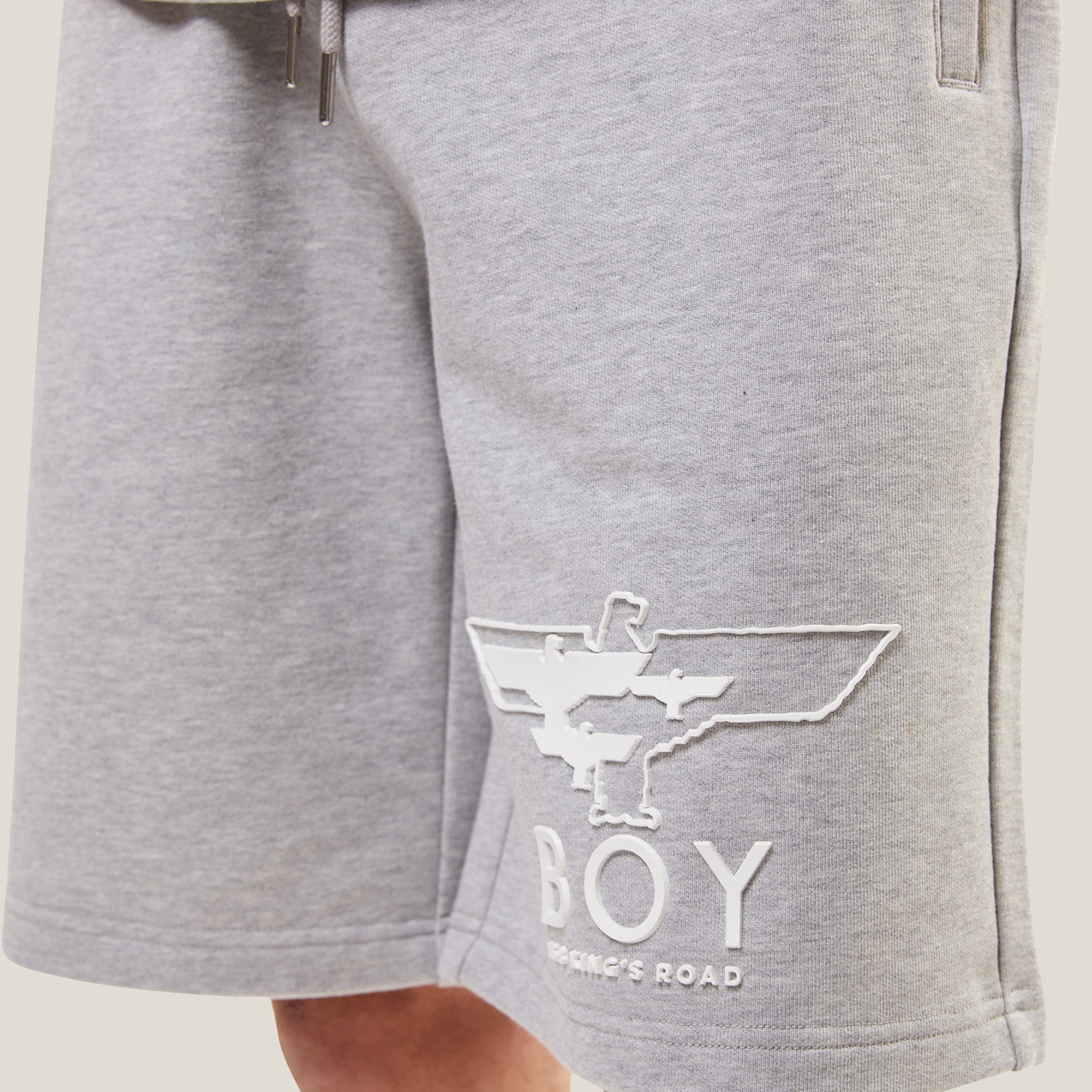 Gray BOY London shorts with a logo on a white background