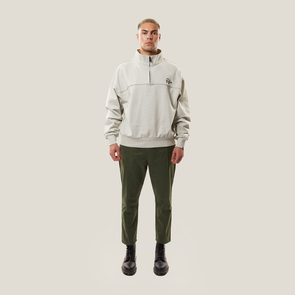 Model wearing BOY London sweat shirt on white background