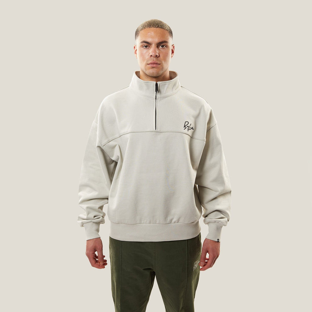 Model wearing BOY London sweat shirt on white background