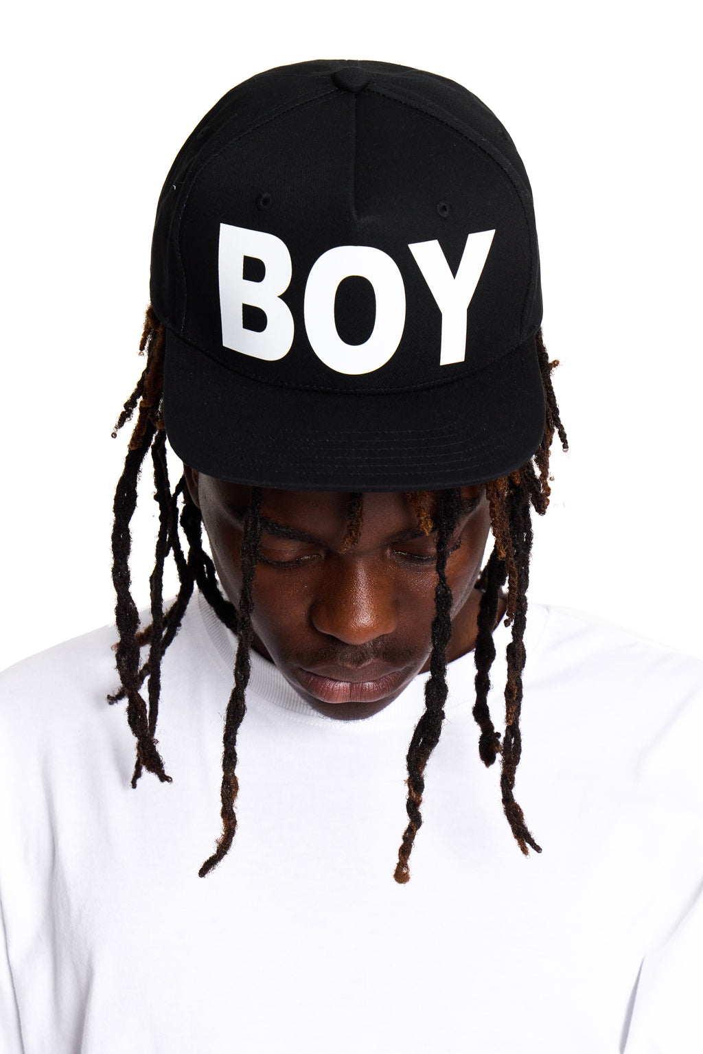 Black cap with 'BOY' London printed in white on a white background