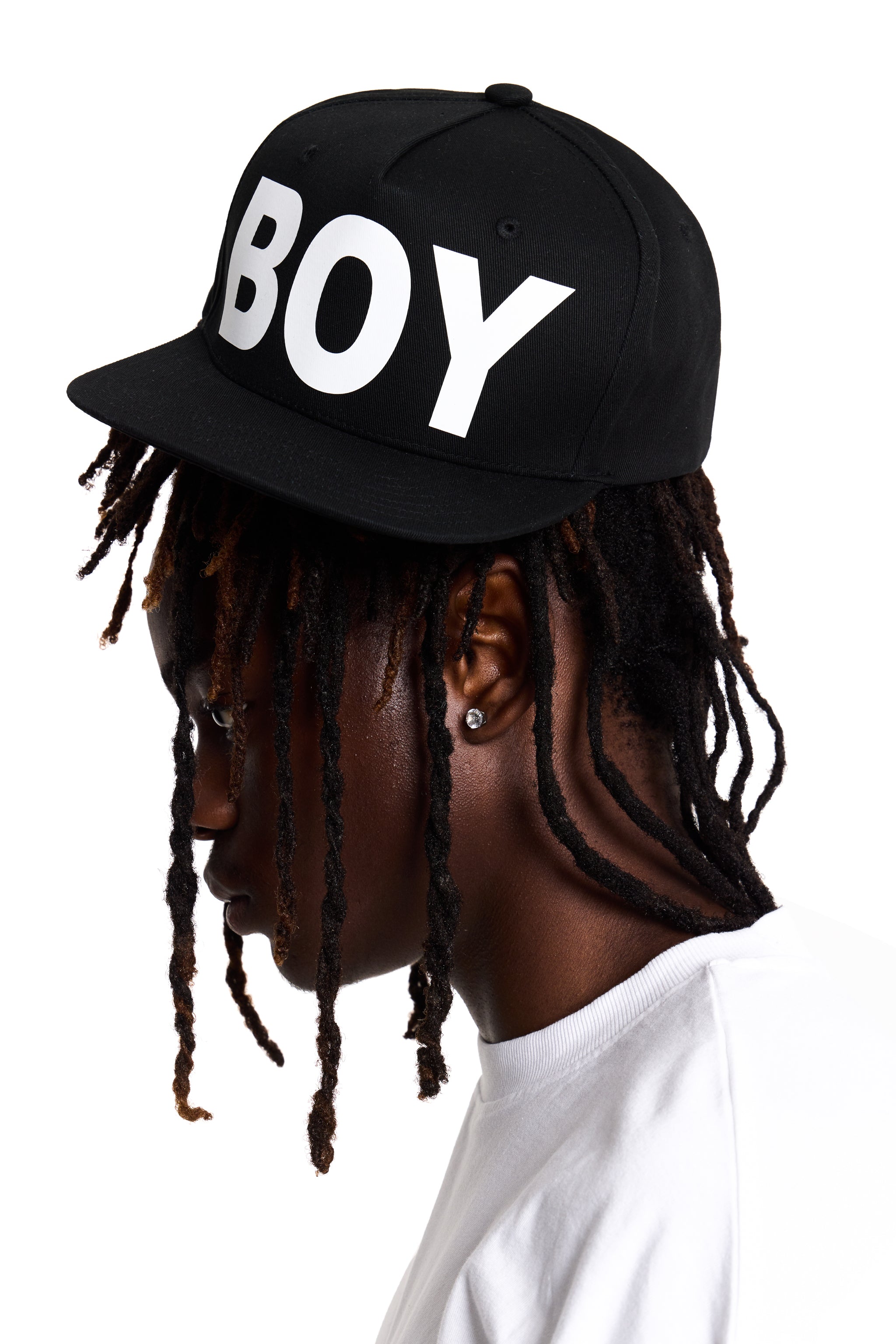 Black cap with 'BOY' London printed in white on a white background