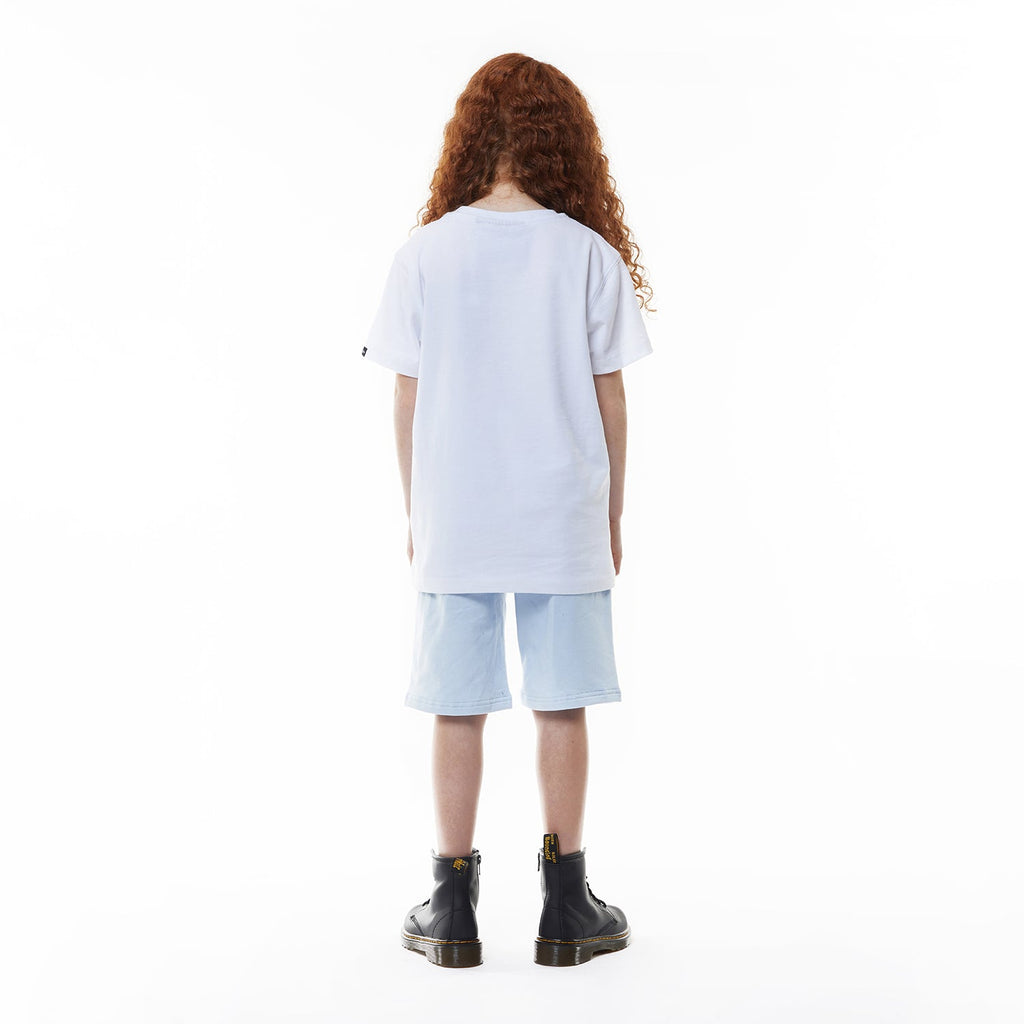 Model wearing BOY London shorts on white background