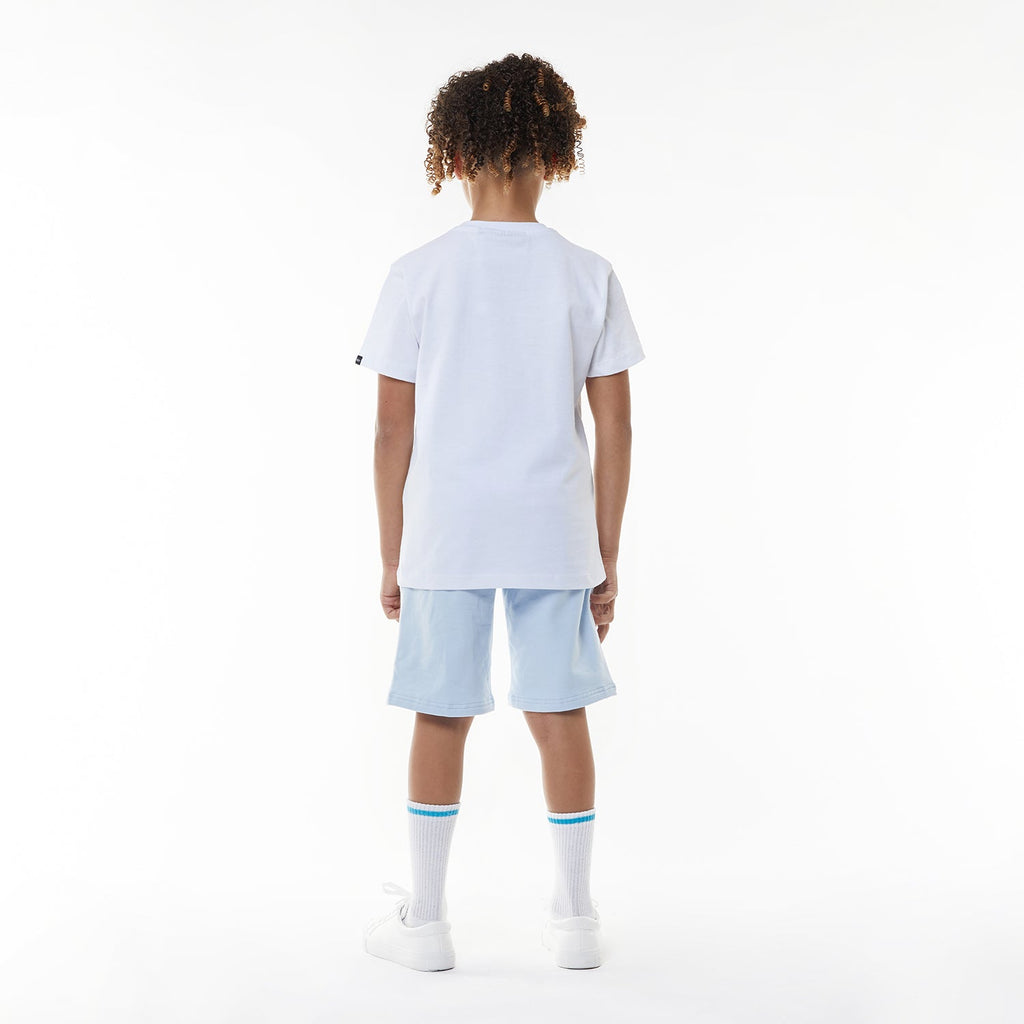 Model wearing BOY London shorts on white background
