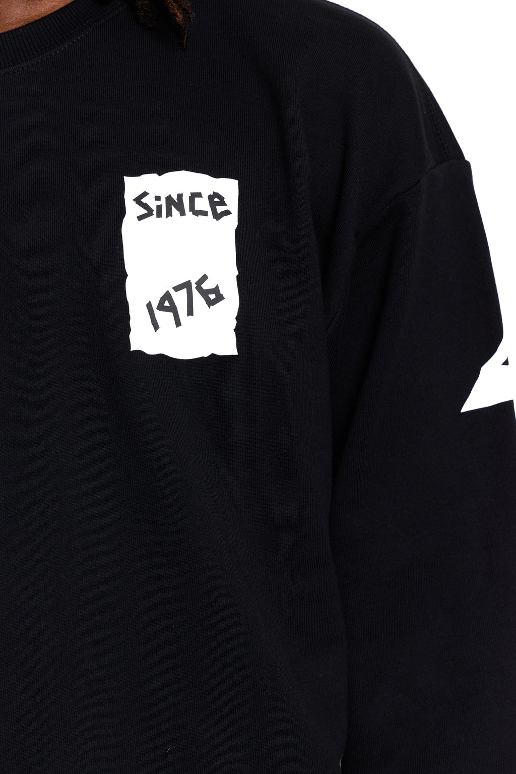 Black BOY London sweatshirt with white graphic design on a white background