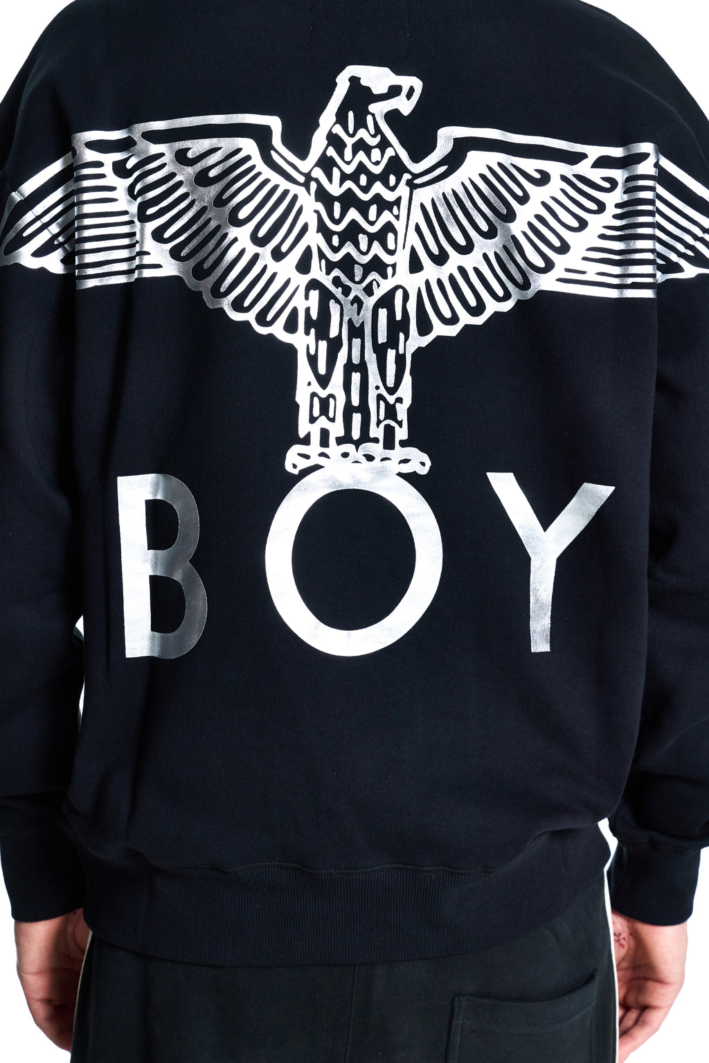 Black BOY London sweatshirt with white eagle design and 'BOY' text on the back