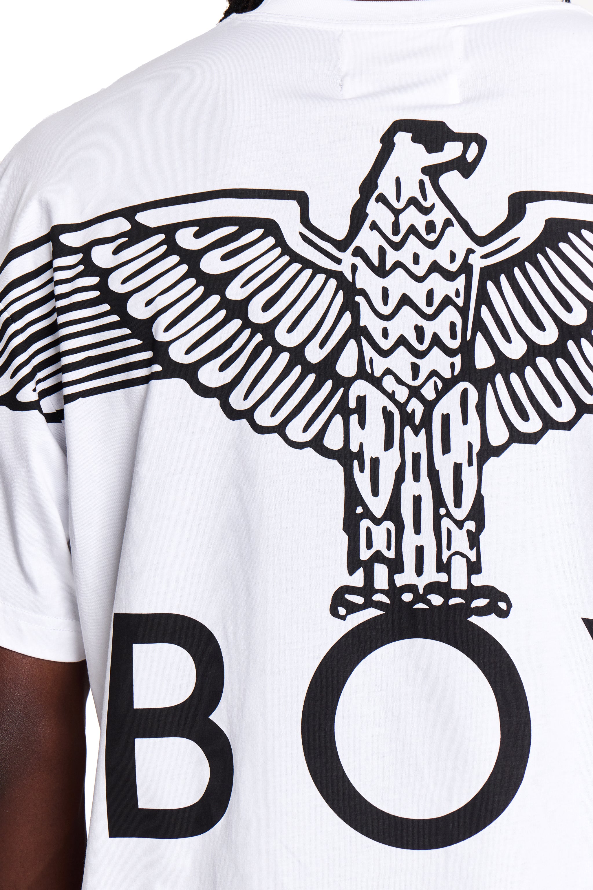 Model White BOY London t-shirt with black eagle design and 'BOY' letters on a white background