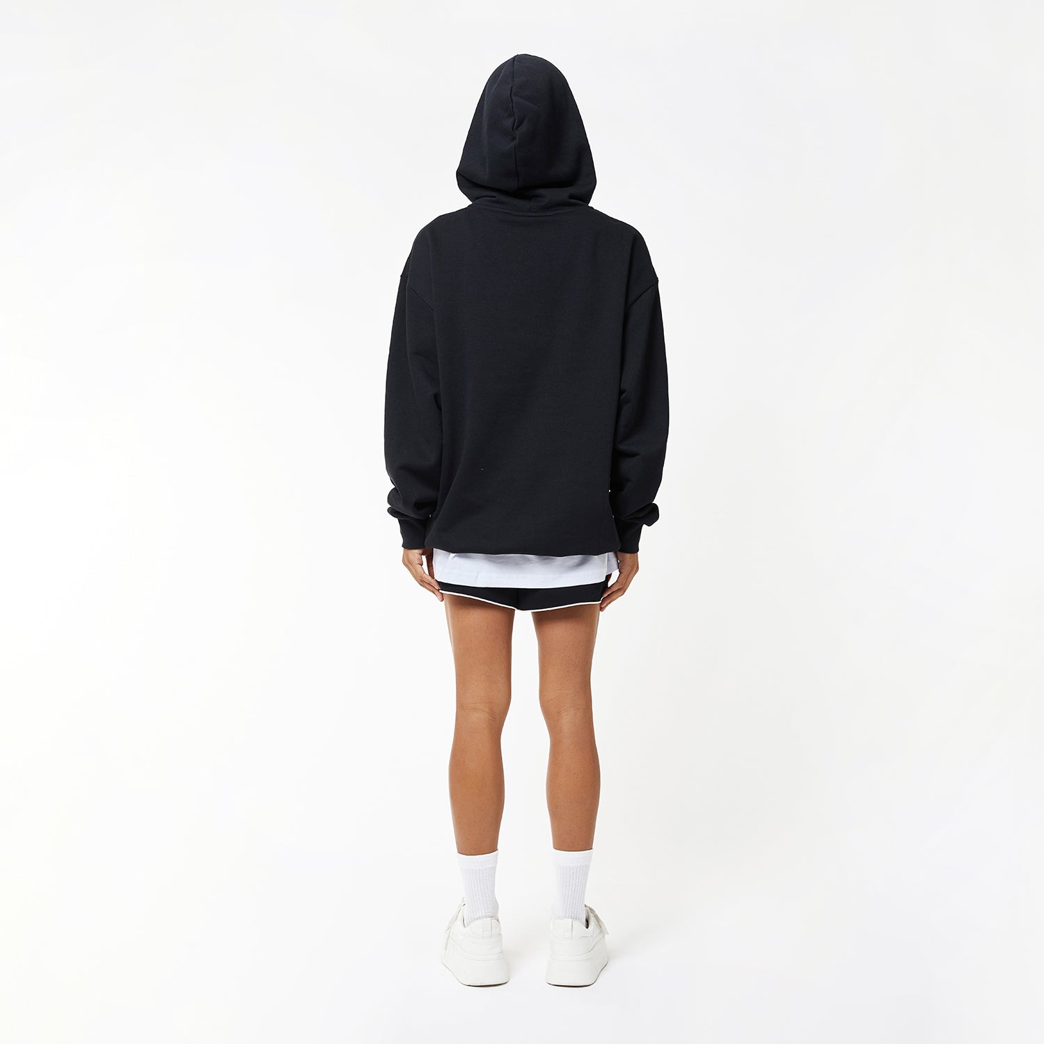 female model wearing Boy London eagle hoodie on white background 