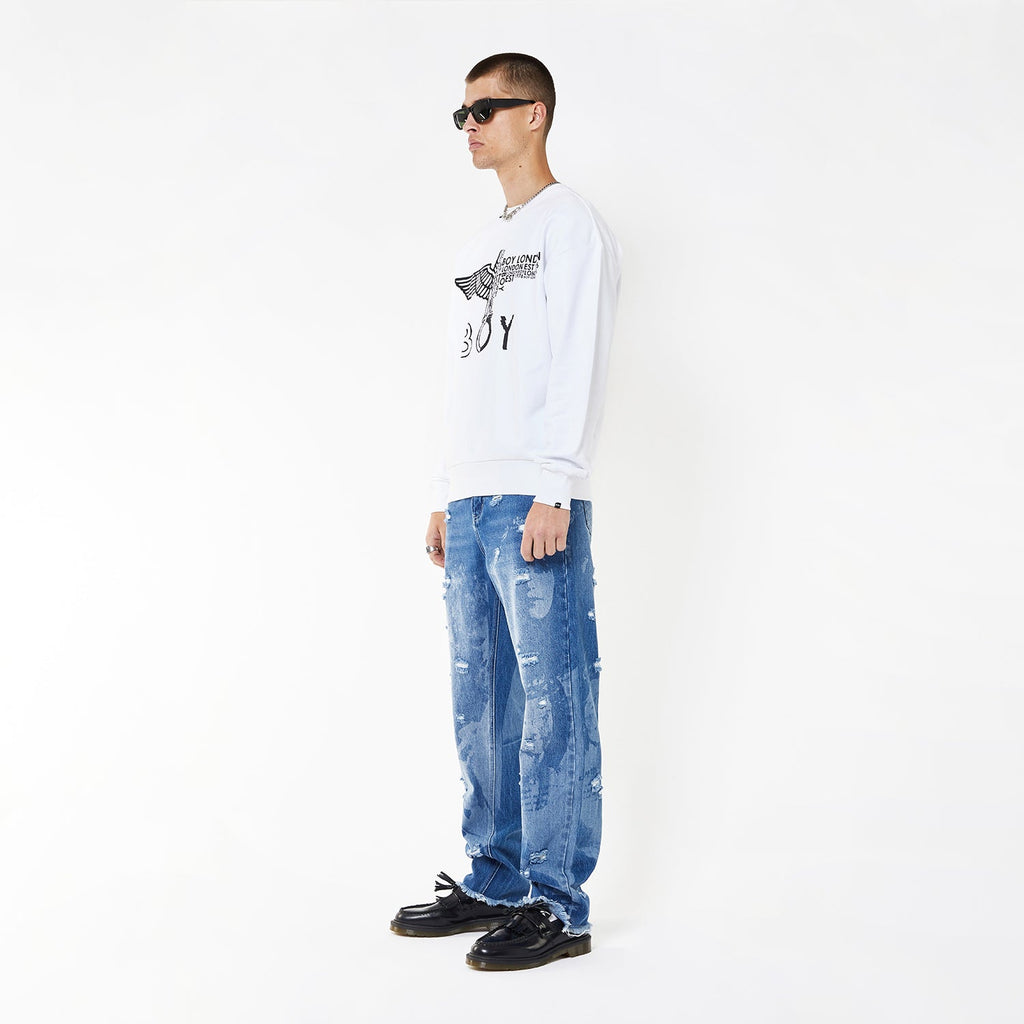 Model wearing BOY London sweatshirt on white background