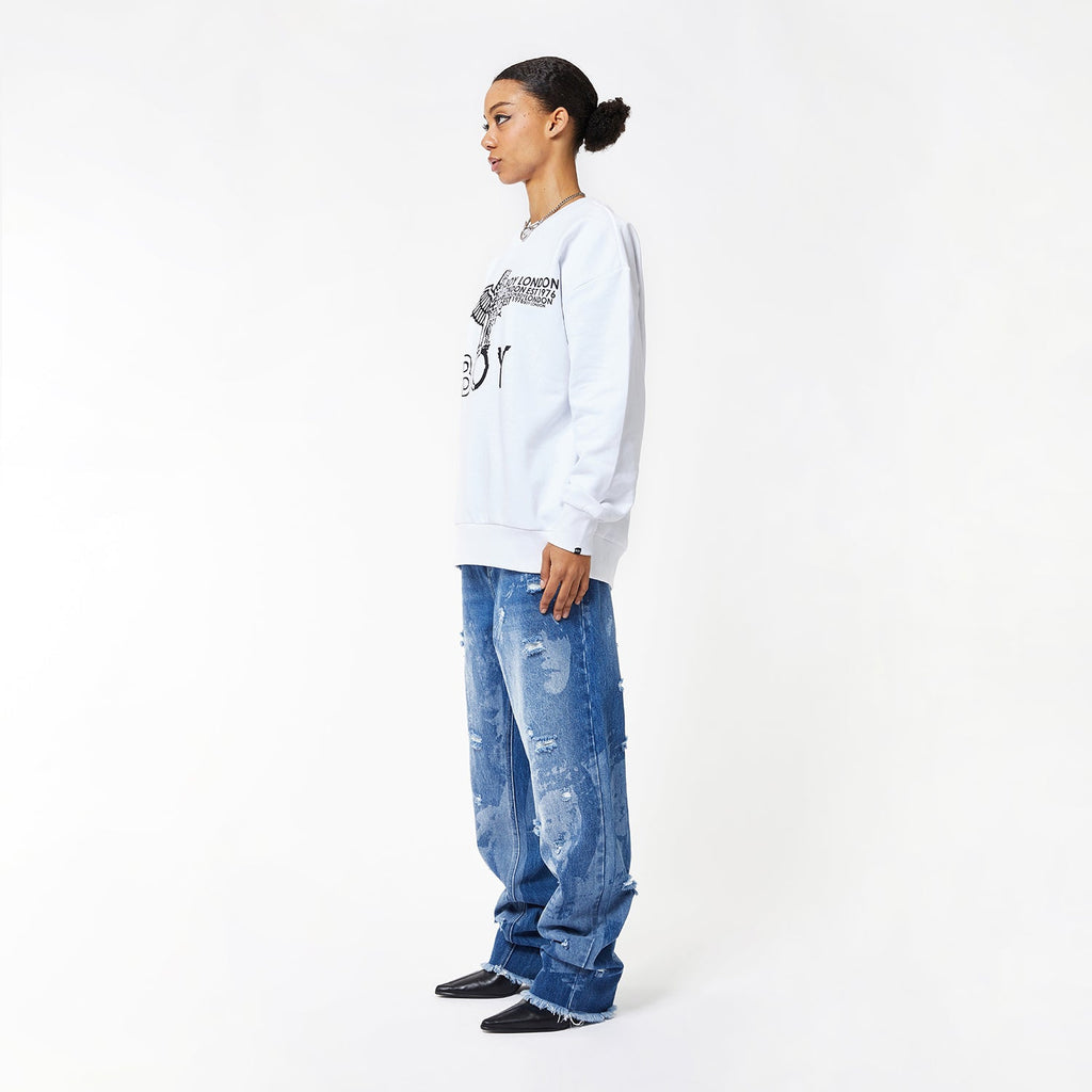 Model wearing BOY London sweatshirt on white background