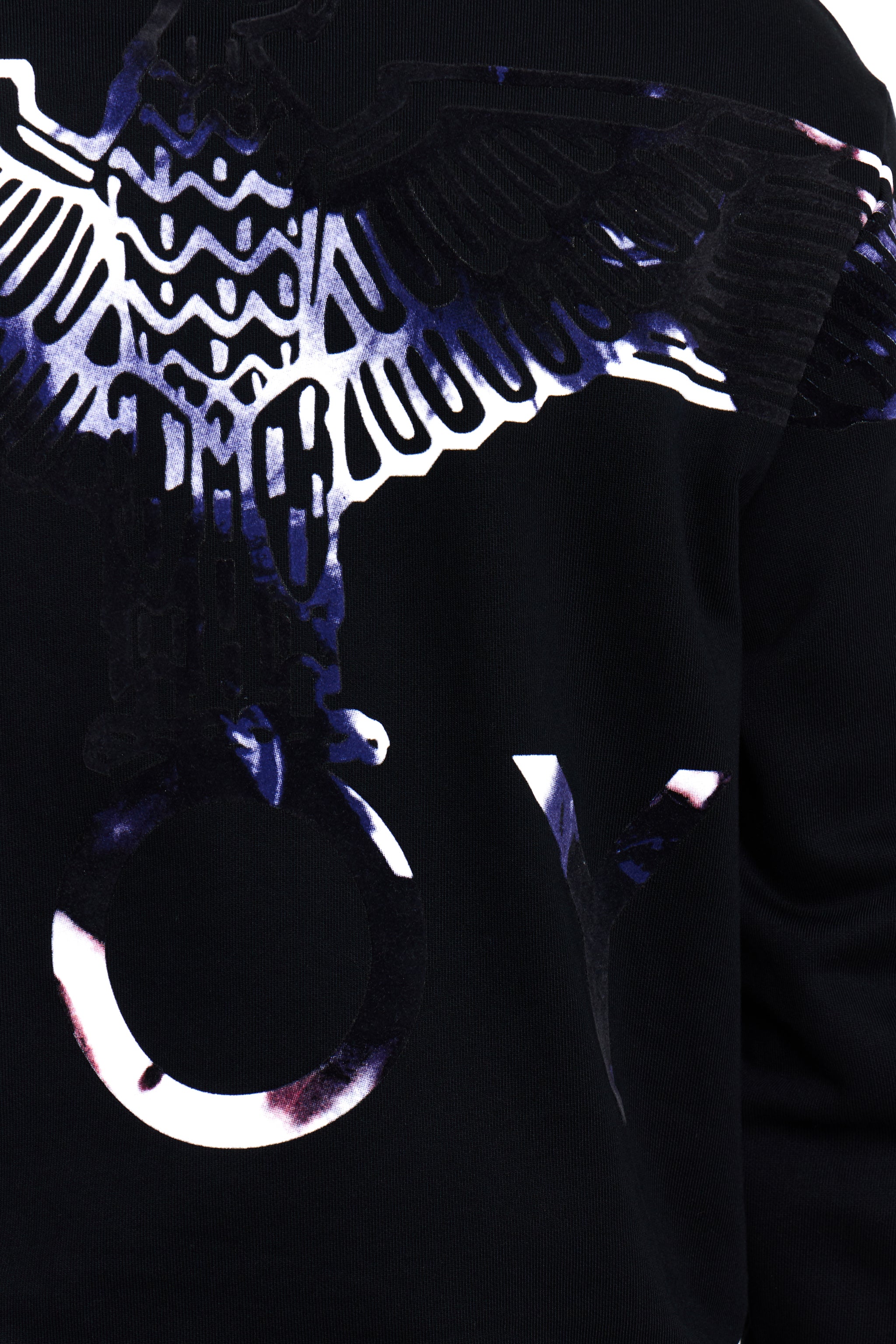 Model wearing Black BOY London hoodie with reflective wing design on a dark background