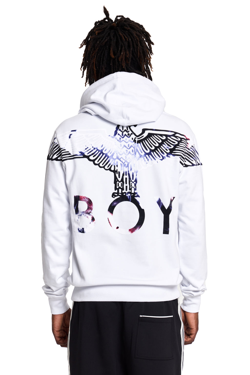 Model wearing a white BOY London hoodie with black and blue graphics on the back, on a white background