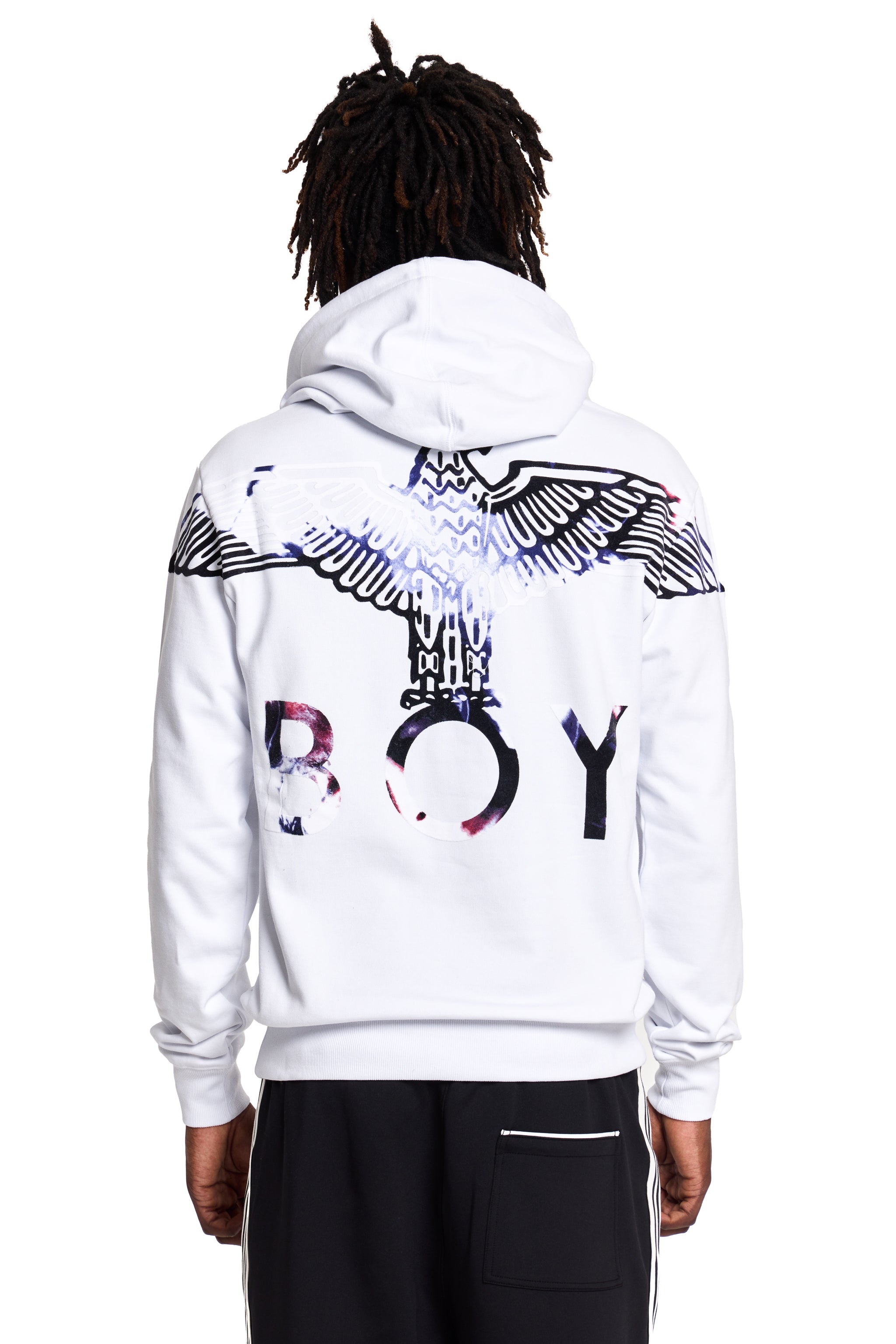 Model wearing a white BOY London hoodie with black and blue graphics on the back, on a white background