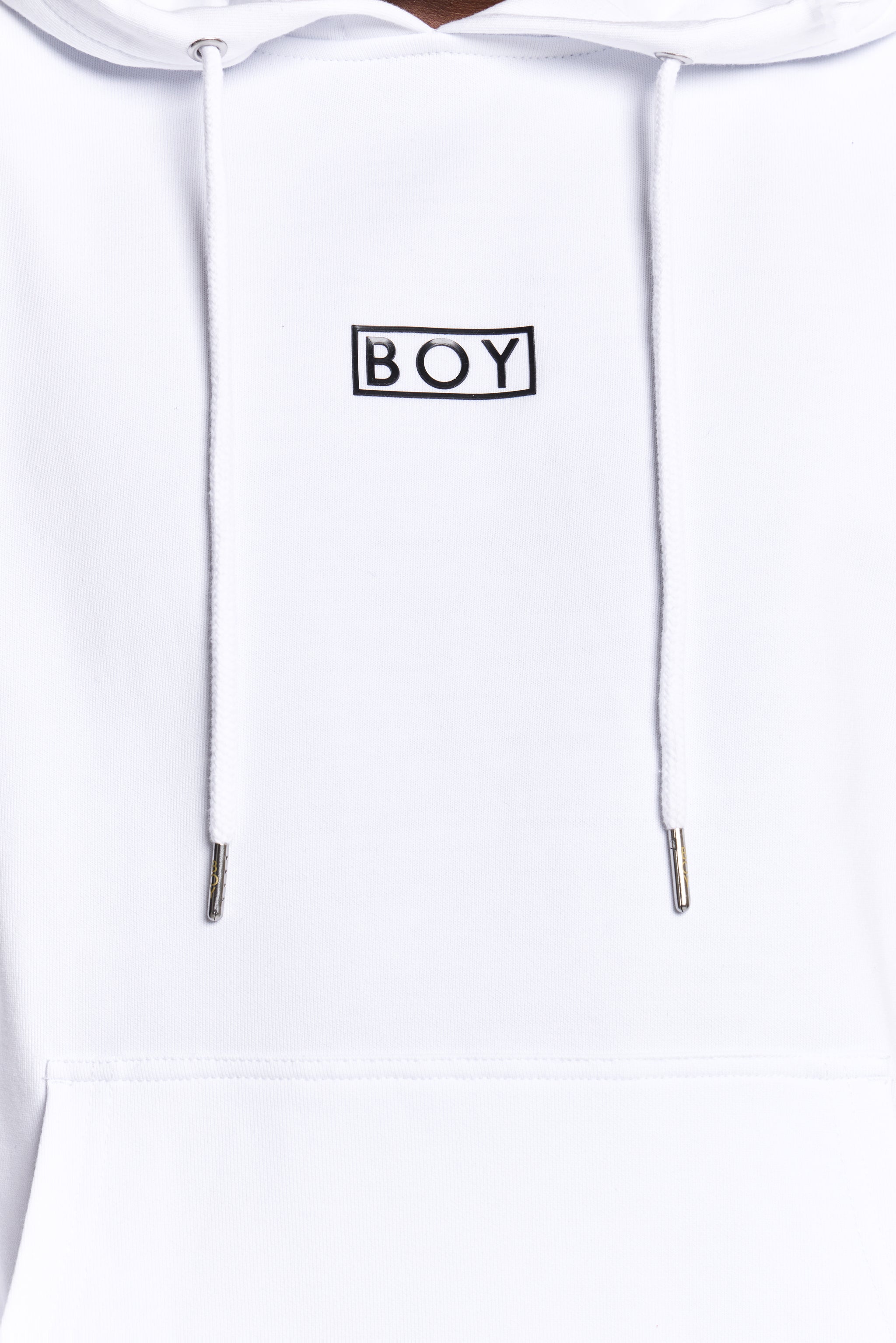 Model wearing White hoodie with 'BOY' London logo on a white background