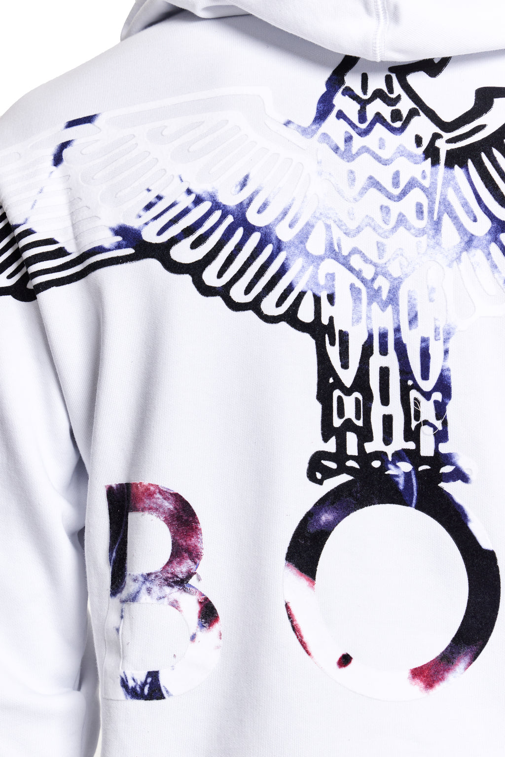 Model wearing White BOY London hoodie with black and multicolor abstract design on the back