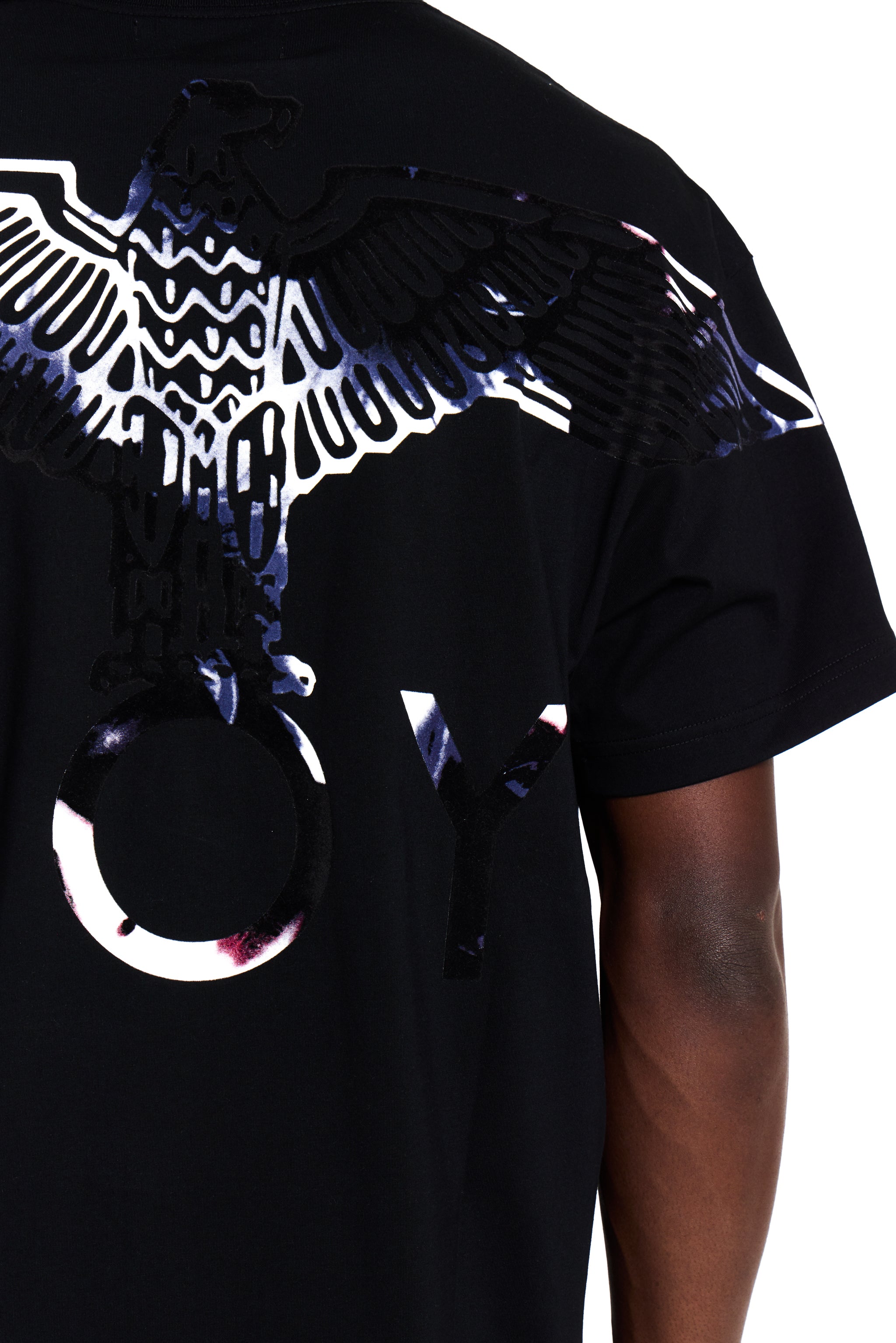 Black BOY London t-shirt with a large white eagle design on a person against a white background