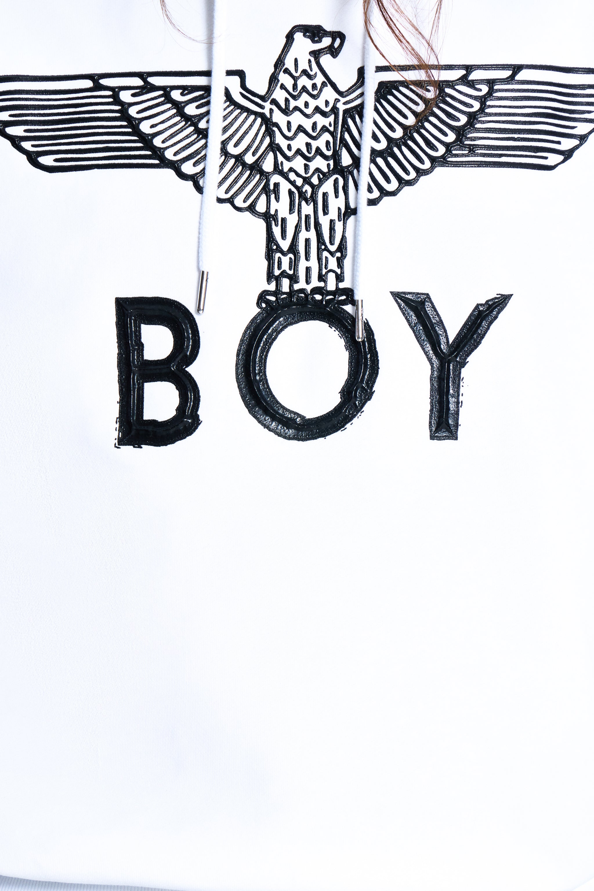 White sweatshirt with black eagle design and 'BOY' text on a white background