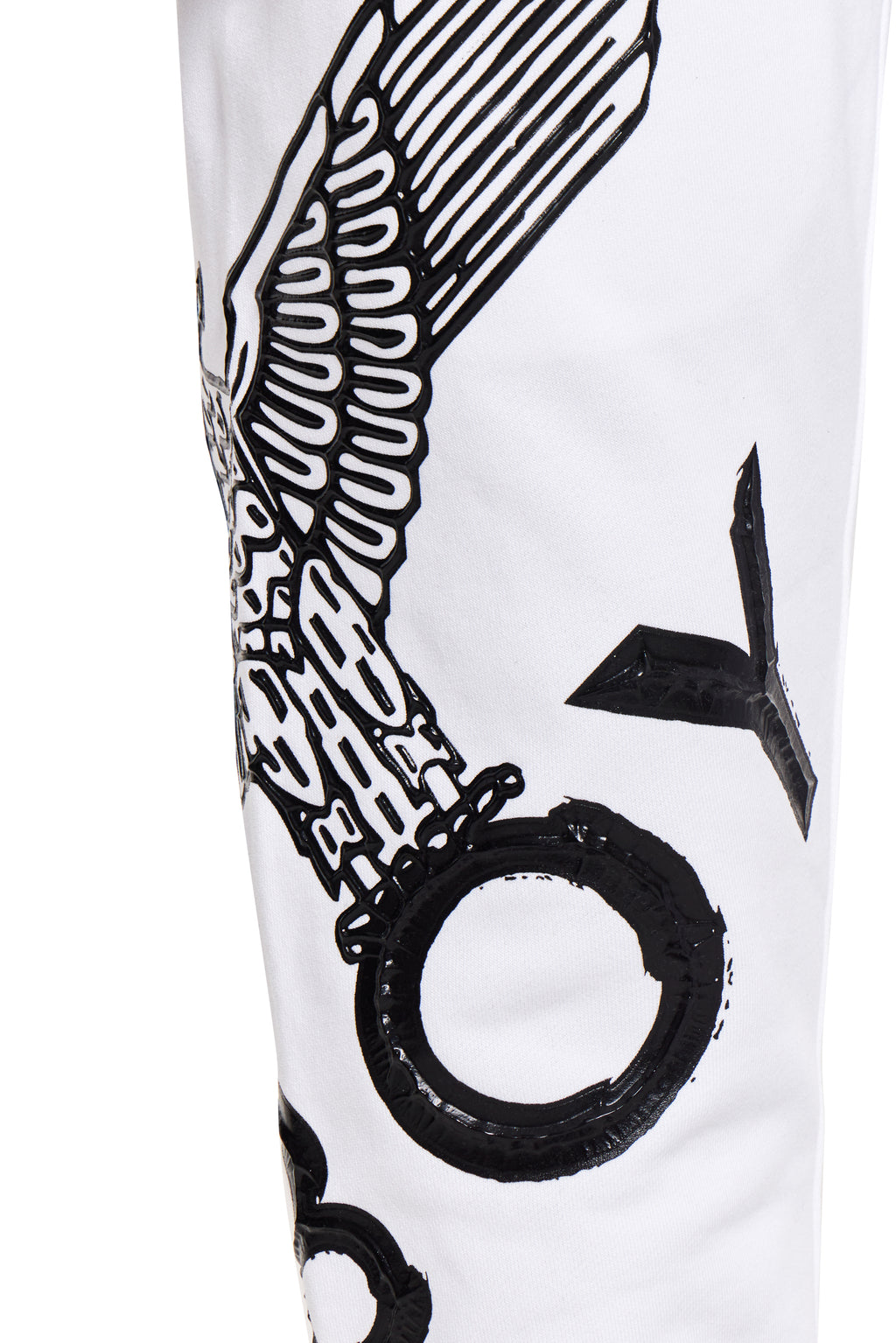 White BOY London shorts with black abstract designs on a white background