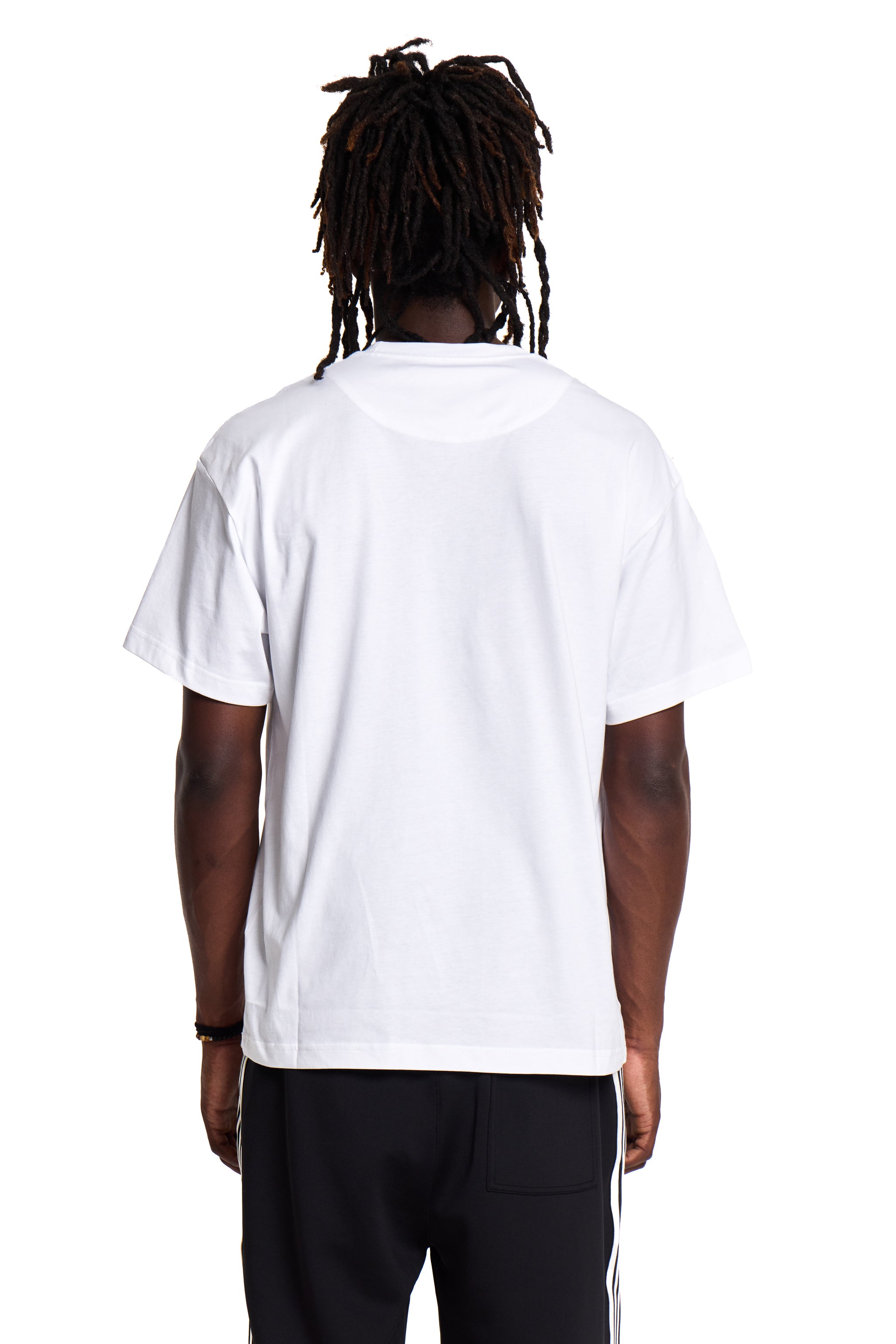 Person wearing a white BOY London t-shirt on a white background