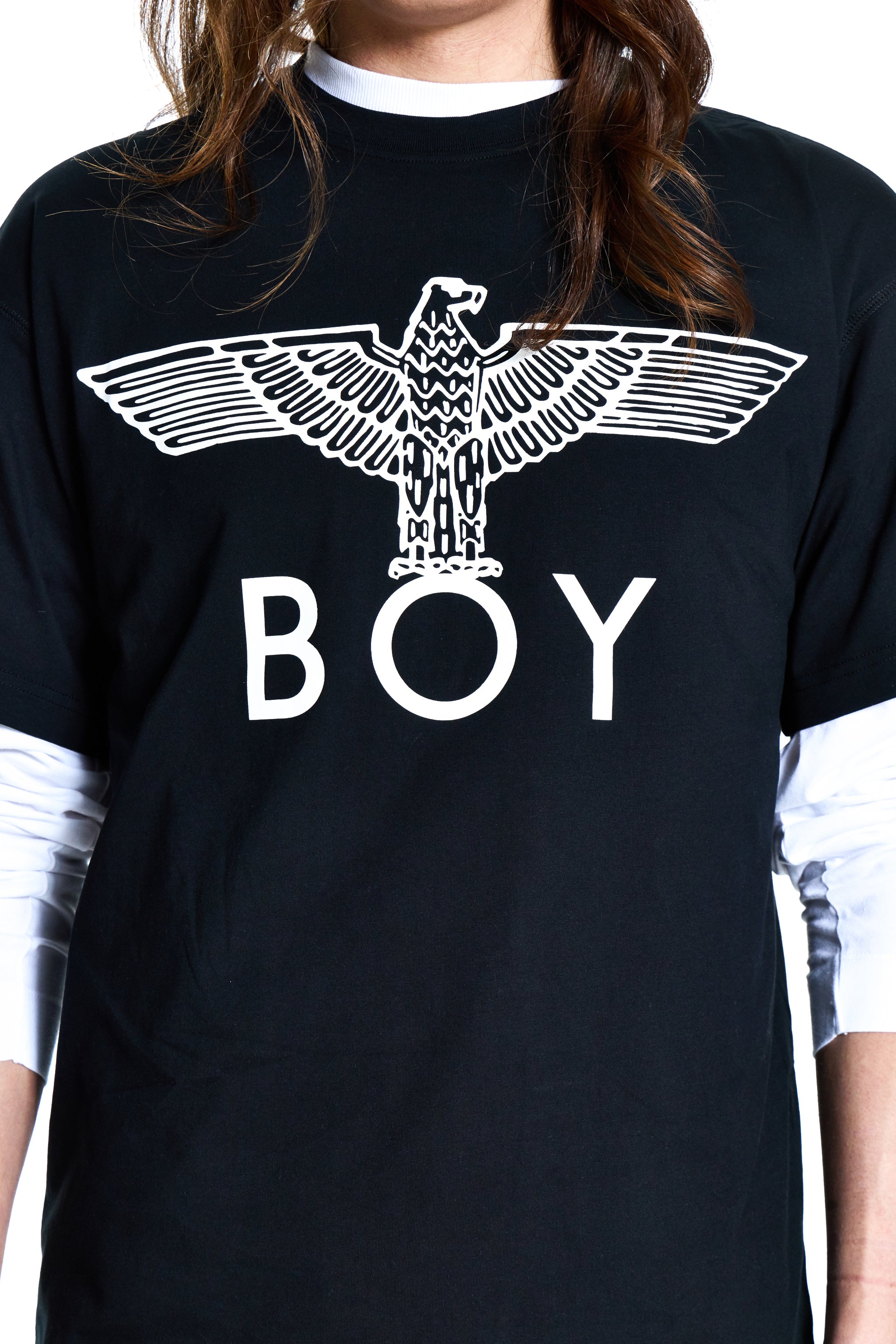 Black Boy London t-shirt with white eagle design and 'BOY' text on a person wearing it.