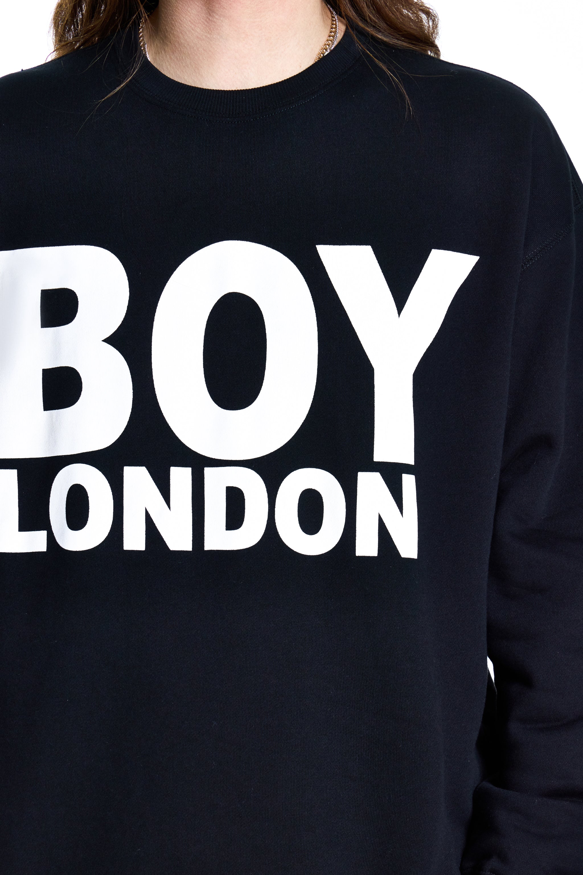 Black sweatshirt with 'BOY LONDON' text on a white background