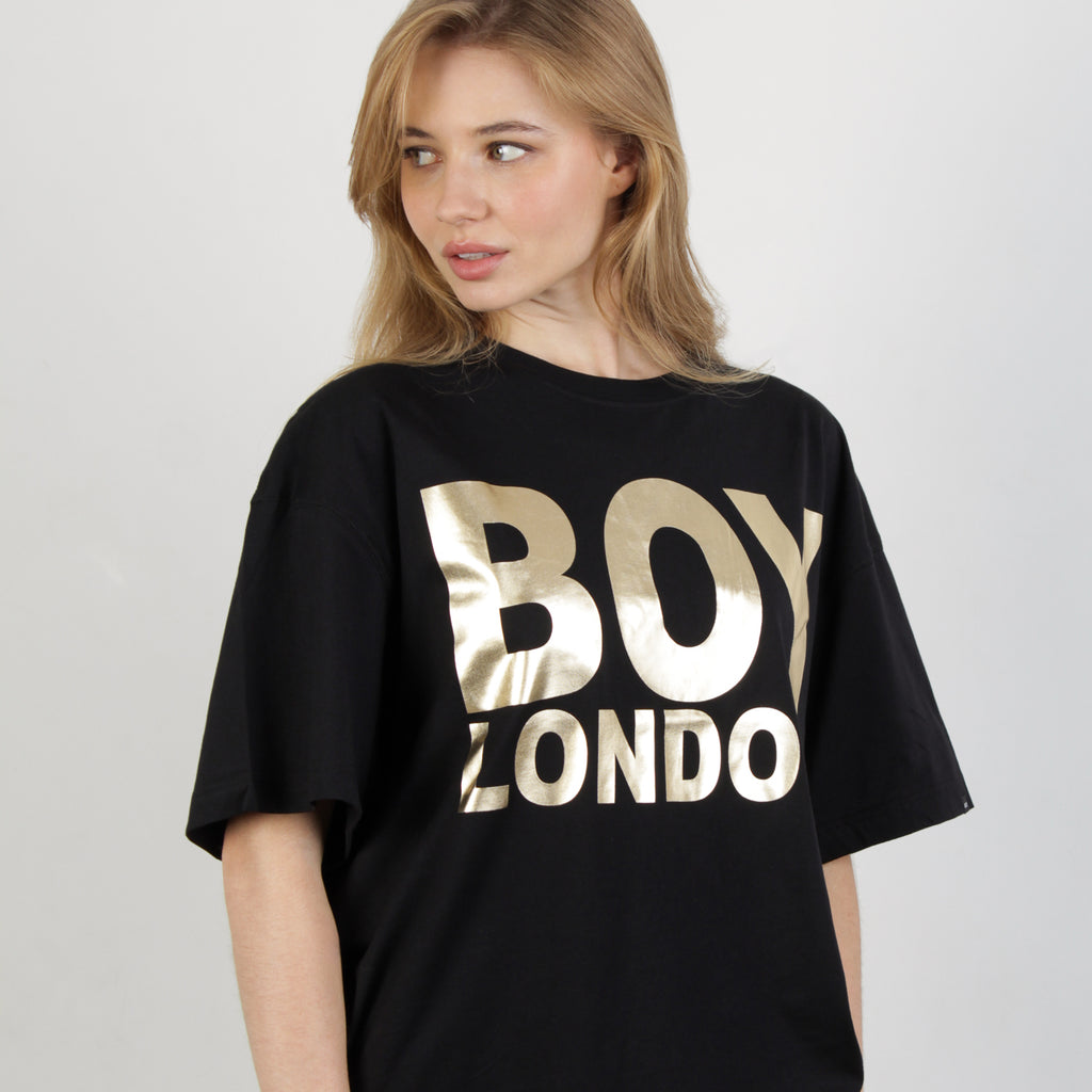 female model wearing BOY London on white background 